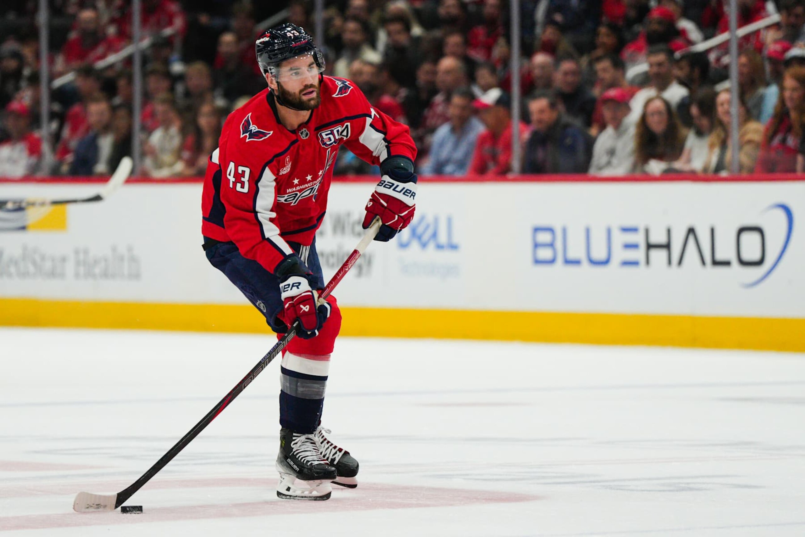 WASHINGTON, DC - OCTOBER 23: Tom Wilson #43 of the Washington Capitals skates with the puck during the first period of a game against the Philadelphia Flyers at Capital One Arena on October 23, 2024 in Washington, D.C. (Photo by Jess Rapfogel/NHLI via Getty Images)