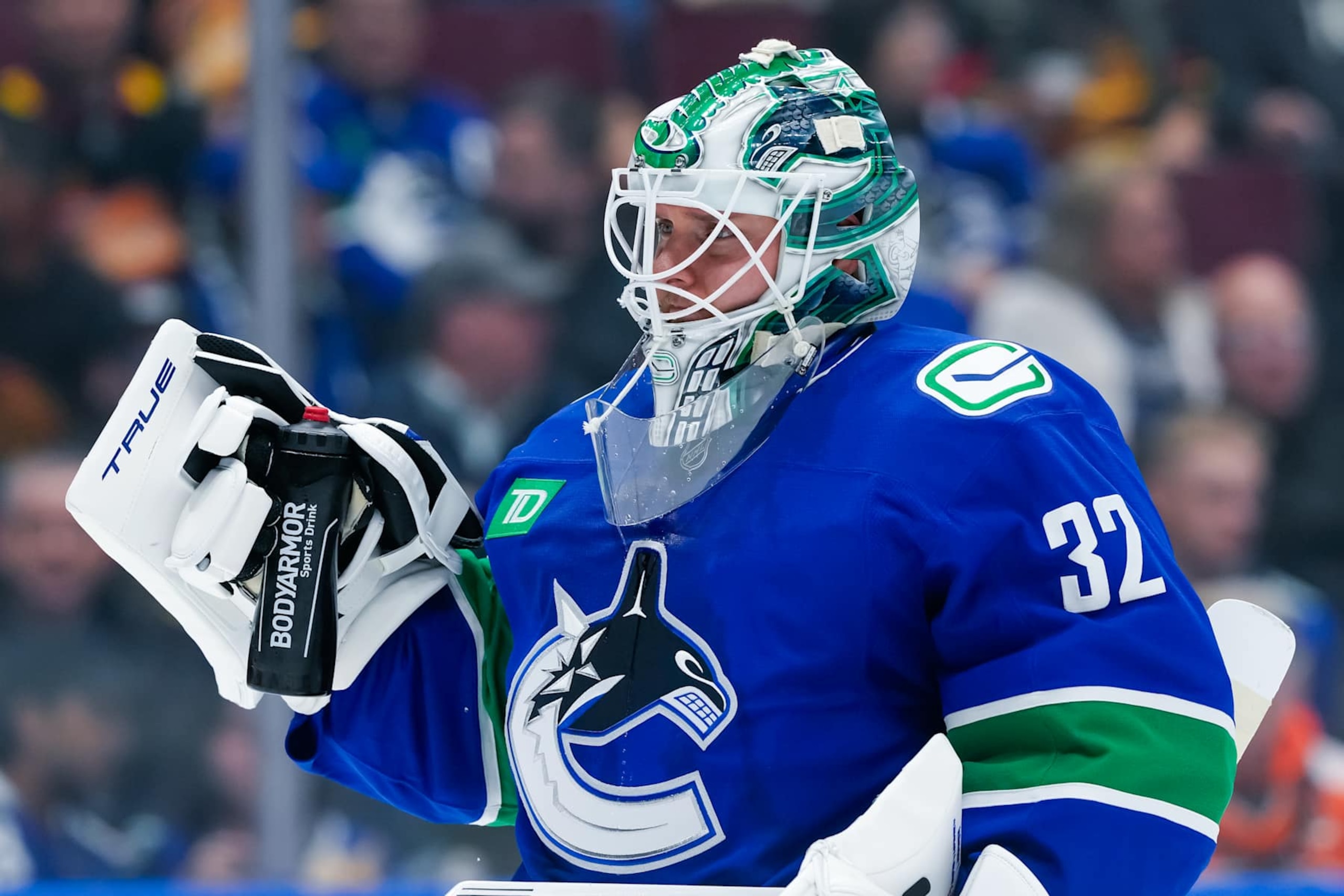 VANCOUVER, CANADA - OCTOBER 11: Kevin Lankinen #32 of the Vancouver Canucks waits for a face-off during the third period of their NHL game against the Philadelphia Flyers at Rogers Arena on October 11, 2024 in Vancouver, British Columbia, Canada. (Photo by Derek Cain/Getty Images)