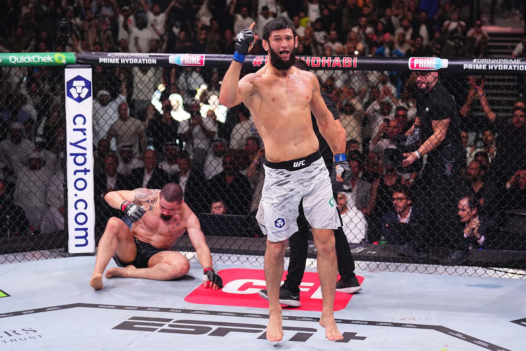 Khamzat Chimaev reacts after a submission victory against Robert Whittaker at UFC 308