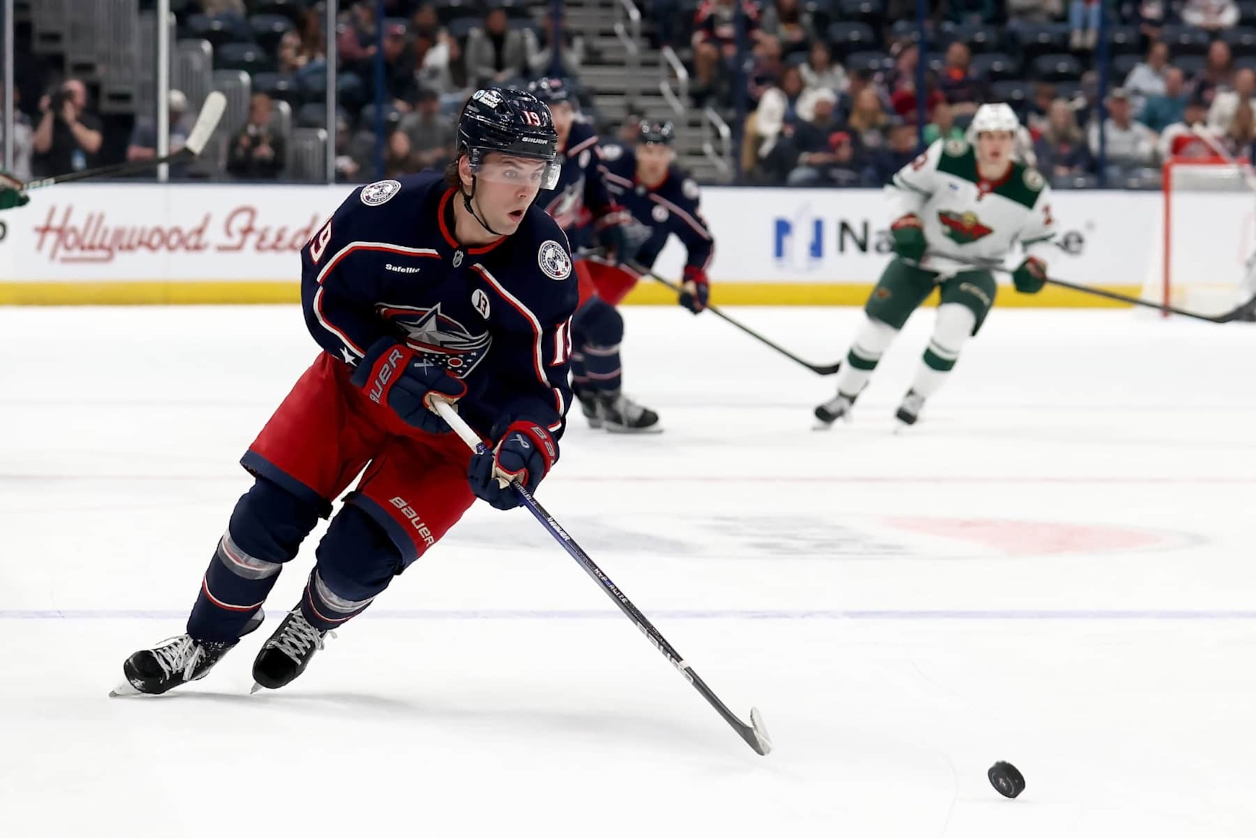 COLUMBUS, OHIO - OCTOBER 19:  Adam Fantilli #19 of the Columbus Blue Jackets skates after the puck during the game against the Minnesota Wild at Nationwide Arena on October 19, 2024 in Columbus, Ohio. Minnesota defeated Columbus 3-1. (Photo by Kirk Irwin/NHLI via Getty Images)