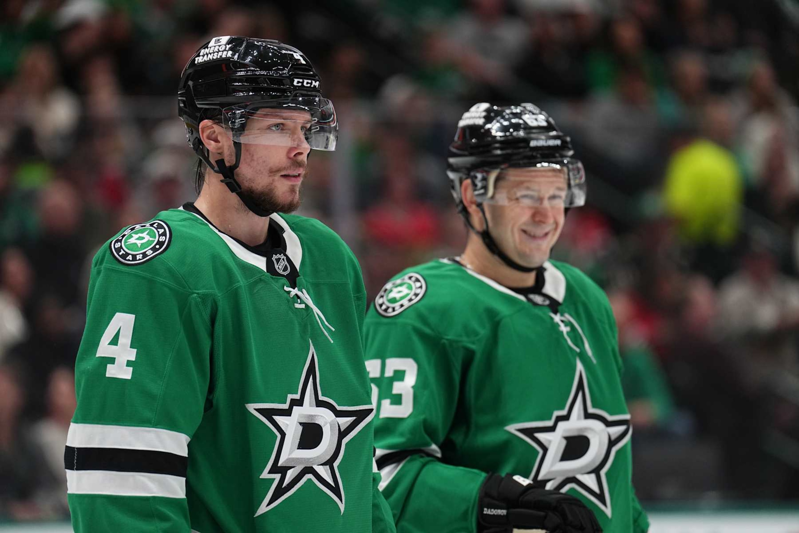 DALLAS, TX - OCTOBER 26: Miro Heiskanen #4 and Evgenii Dadonov #63 of the Dallas Stars line up against the Chicago Blackhawks at the American Airlines Center on October 26, 2024 in Dallas, Texas. (Photo by Glenn James/NHLI via Getty Images)