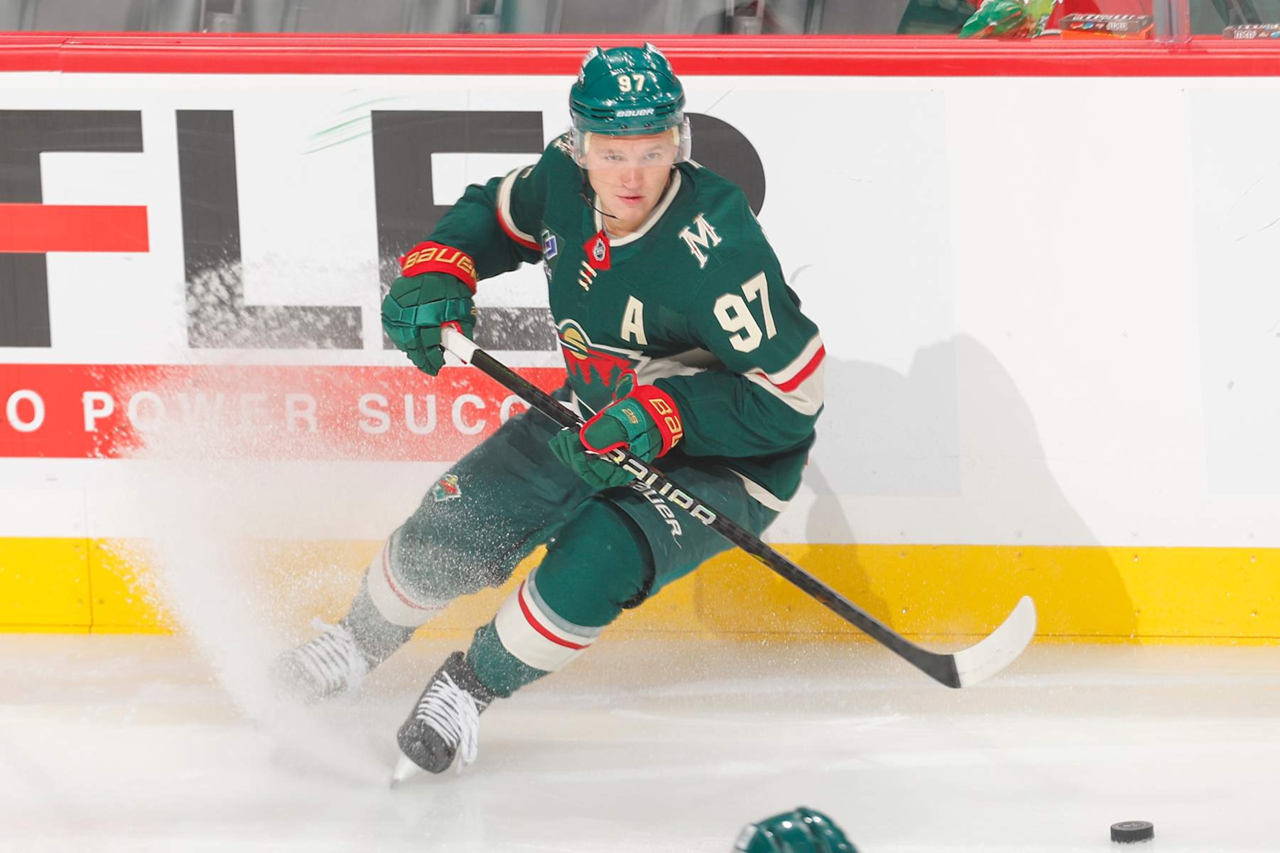 SAINT PAUL, MN - OCTOBER 12: Kirill Kaprizov #97 of the Minnesota Wild handles the puck against the Seattle Kraken during the game at the Xcel Energy Center on October 12, 2024 in Saint Paul, Minnesota. (Photo by Bruce Kluckhohn/NHLI via Getty Images)