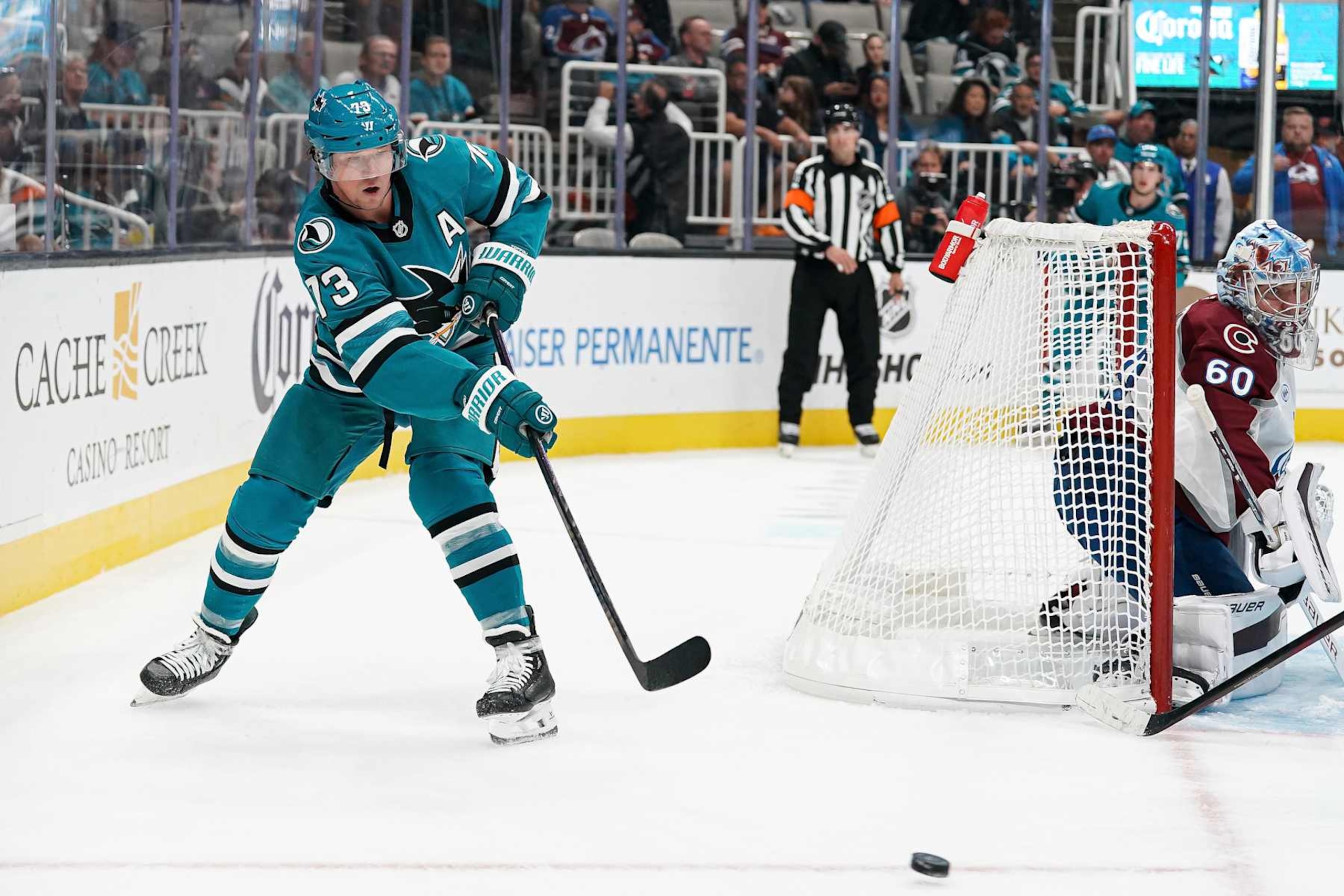 SAN JOSE, CA - OCTOBER 20: Tyler Toffoli #73 of the San Jose Sharks passes the puck in the third period against the Colorado Avalanche at SAP Center on October 20, 2024 in San Jose, California. (Photo by Kavin Mistry/NHLI via Getty Images)