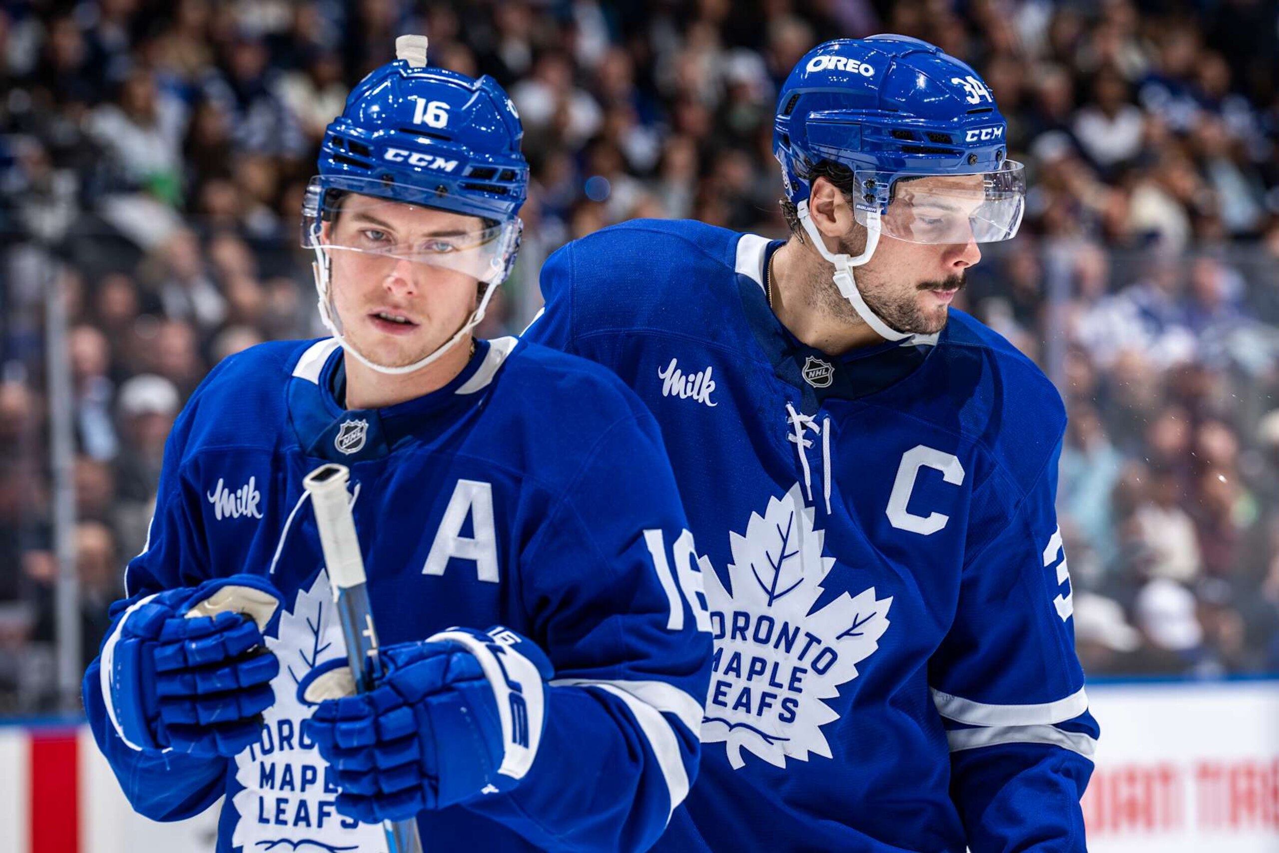 TORONTO, ON - OCTOBER 24:  Auston Matthews #34 of the Toronto Maple Leafs and Mitch Marner #16 skate during a break in play against the St. Louis Blues at the Scotiabank Arena on October 24, 2024 in Toronto, Ontario, Canada. (Photo by Kevin Sousa/NHLI via Getty Images)