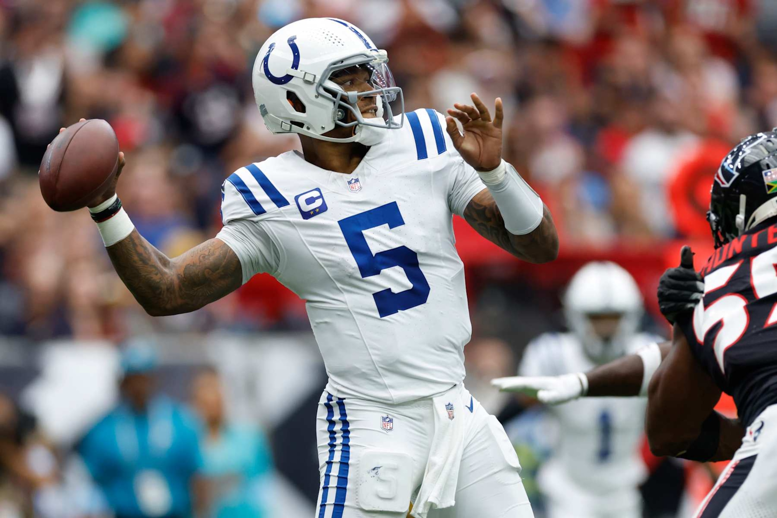 HOUSTON, TEXAS - OCTOBER 27: Anthony Richardson #5 of the Indianapolis Colts throws a pass during the second quarter against the Houston Texans at NRG Stadium on October 27, 2024 in Houston, Texas. (Photo by Tim Warner/Getty Images)