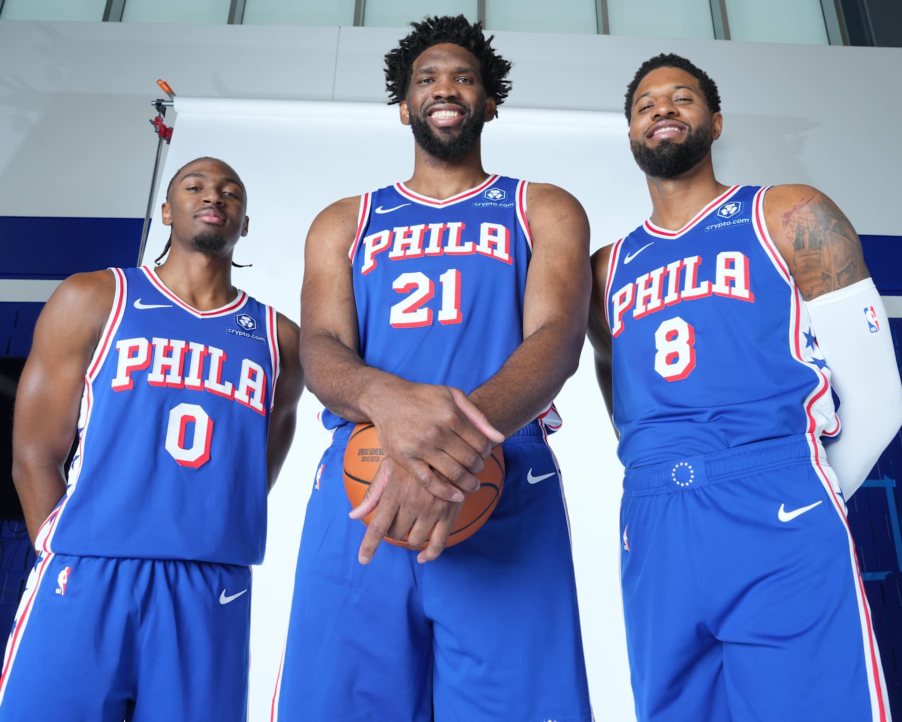 CAMDEN, NJ - SEPTEMBER 30: Tyrese Maxey #0, Joel Embiid #21, and Paul George #8 of the Philadelphia 76ers pose for a portrait during NBA Media Day on September 30, 2024 at the Philadelphia 76ers Training Complex in Camden, New Jersey. NOTE TO USER: User expressly acknowledges and agrees that, by downloading and or using this photograph, User is consenting to the terms and conditions of the Getty Images License Agreement. Mandatory Copyright Notice: Copyright 2024 NBAE (Photo by Jesse D. Garrabrant/NBAE via Getty Images)