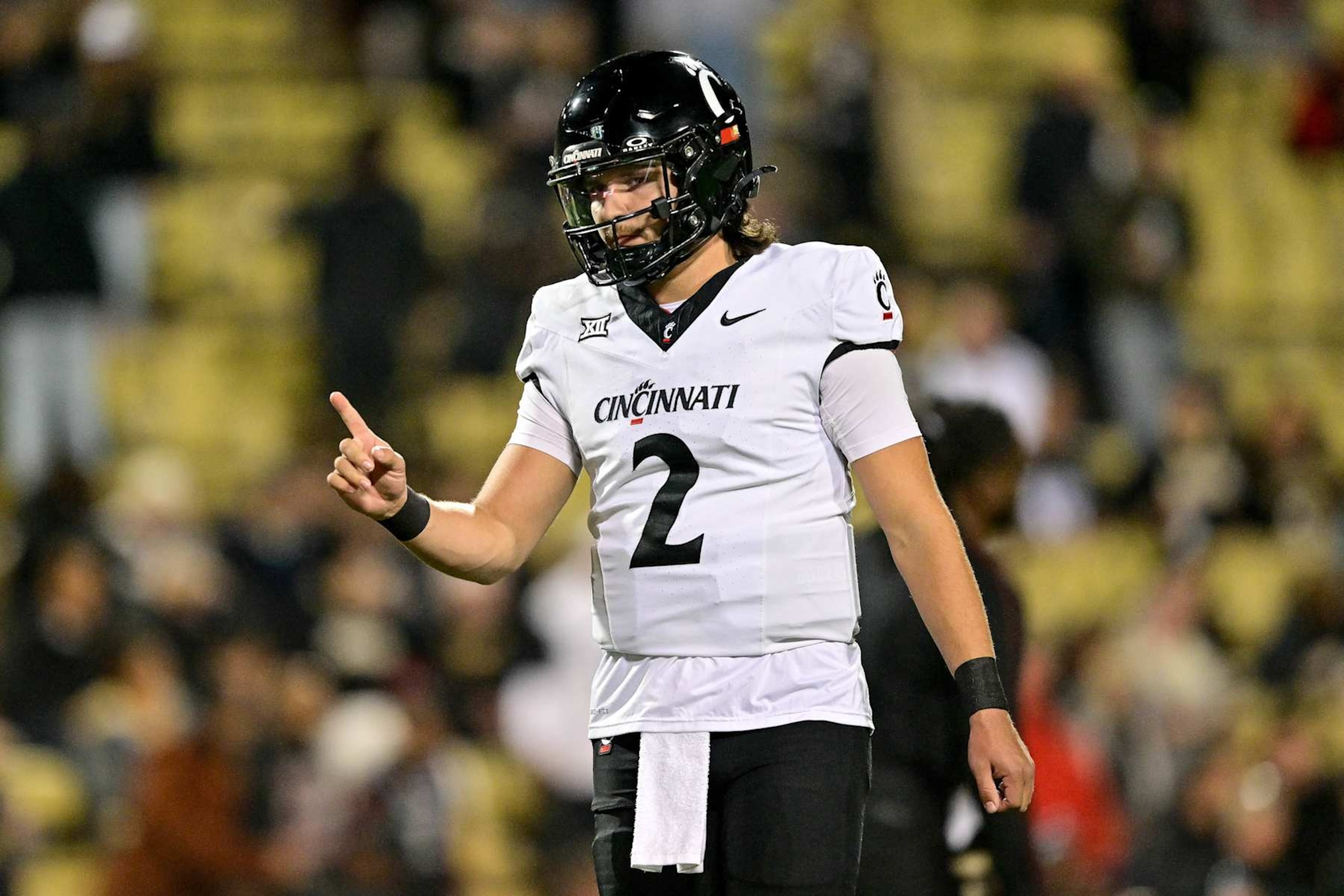 BOULDER, CO - OCTOBER 26: Brendan Sorsby #2 of the Cincinnati Bearcats warms up before a game against the Colorado Buffaloes at Folsom Field on October 26, 2024 in Boulder, Colorado. (Photo by Dustin Bradford/Getty Images) BOULDER, CO - OCTOBER 26: Brendan Sorsby #2 of the Cincinnati Bearcats warms up before a game against the Colorado Buffaloes at Folsom Field on October 26, 2024 in Boulder, Colorado. (Photo by Dustin Bradford/Getty Images)