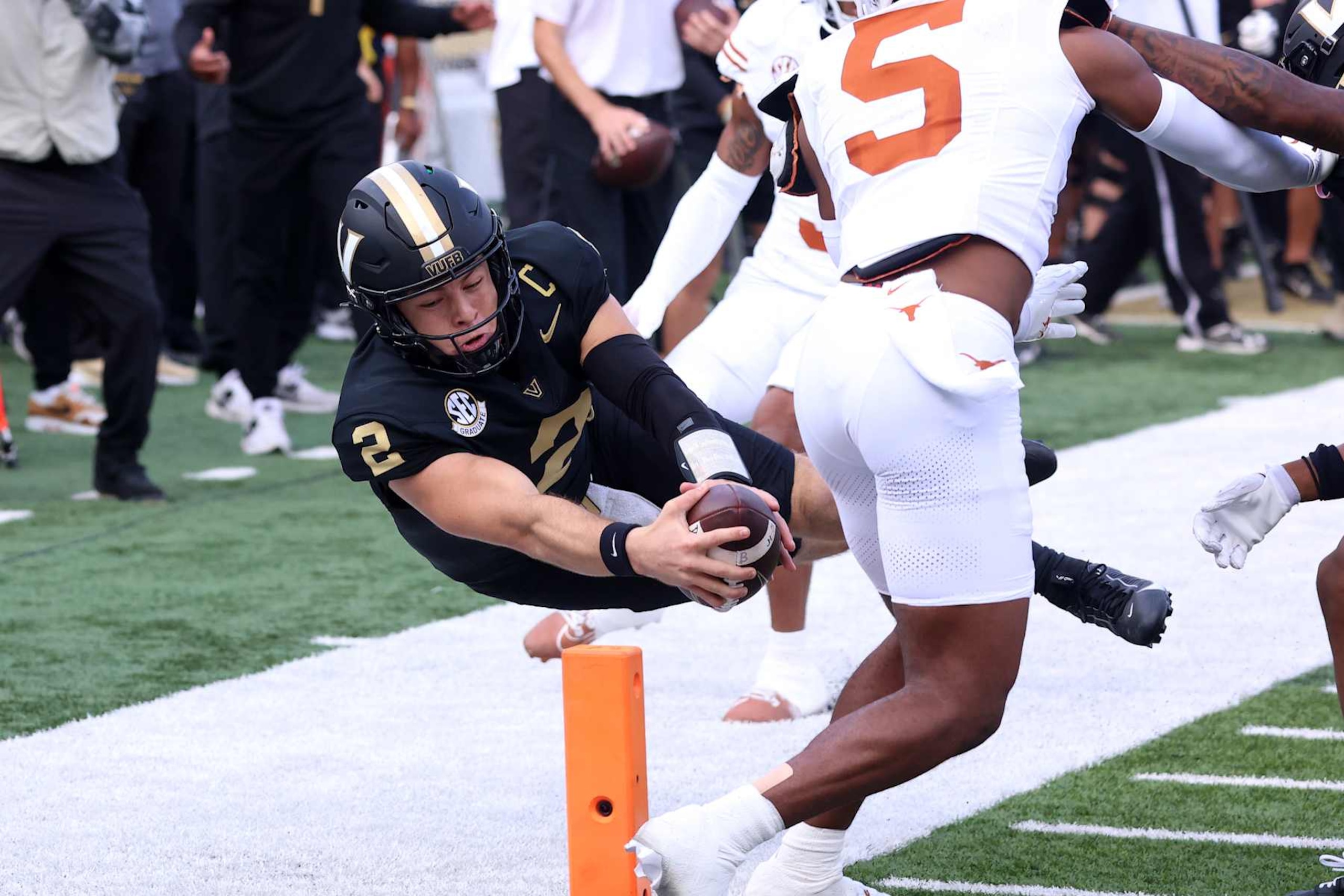 NASHVILLE, TN - OCTOBER 26: Vanderbilt Commodores quarterback Diego Pavia (2) dives for a touchdown during the game between the Vanderbilt Commodores and the Texas Longhorns on October 26, 2024 at FirstbBank Stadium in Nashville, Tennessee. (Photo by Michael Wade/Icon Sportswire via Getty Images) NASHVILLE, TN - OCTOBER 26: Vanderbilt Commodores quarterback Diego Pavia (2) dives for a touchdown during the game between the Vanderbilt Commodores and the Texas Longhorns on October 26, 2024 at FirstbBank Stadium in Nashville, Tennessee. (Photo by Michael Wade/Icon Sportswire via Getty Images)