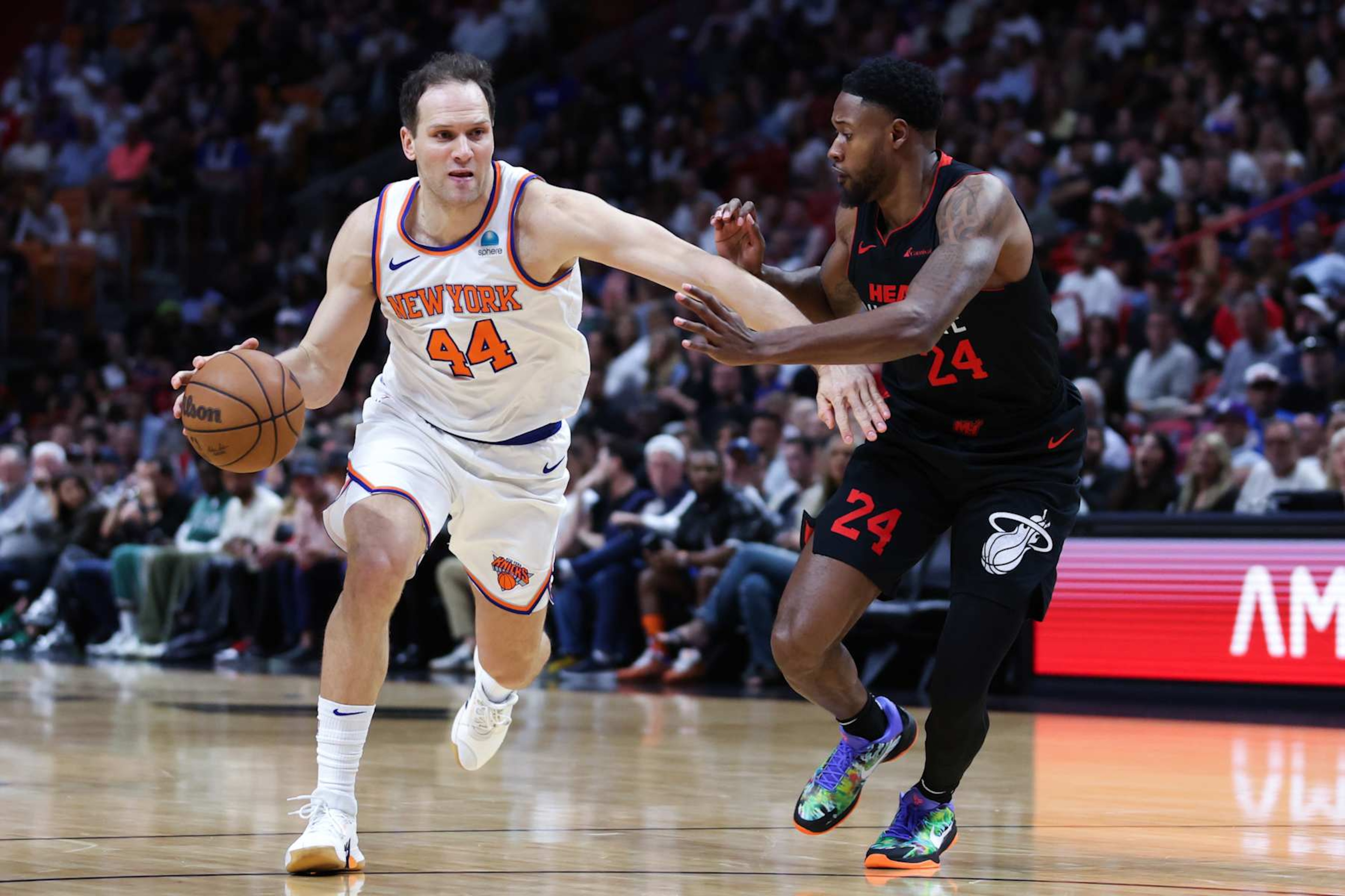 MIAMI, FLORIDA - APRIL 02: Bojan Bogdanovic #44 of the New York Knicks drives against Haywood Highsmith #24 of the Miami Heat during the second quarter of the game at Kaseya Center on April 02, 2024 in Miami, Florida. NOTE TO USER: User expressly acknowledges and agrees that, by downloading and or using this photograph, User is consenting to the terms and conditions of the Getty Images License Agreement. (Photo by Megan Briggs/Getty Images) MIAMI, FLORIDA - APRIL 02: Bojan Bogdanovic #44 of the New York Knicks drives against Haywood Highsmith #24 of the Miami Heat during the second quarter of the game at Kaseya Center on April 02, 2024 in Miami, Florida. NOTE TO USER: User expressly acknowledges and agrees that, by downloading and or using this photograph, User is consenting to the terms and conditions of the Getty Images License Agreement. (Photo by Megan Briggs/Getty Images)