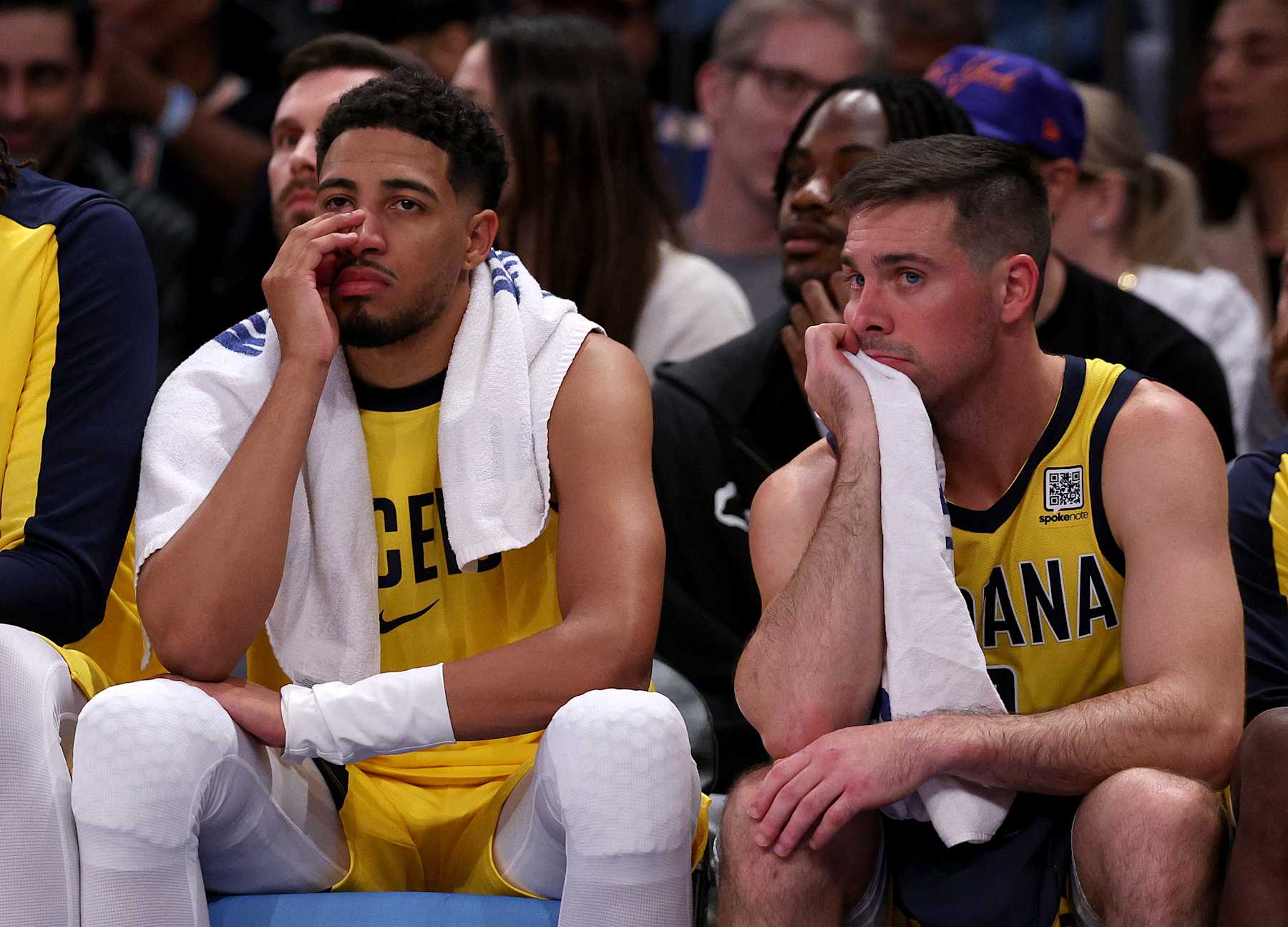 NEW YORK, NEW YORK - OCTOBER 25: Tyrese Haliburton #0 and T.J. McConnell #9 of the Indiana Pacers react on the bench in the fourth quarter against the New York Knicks at Madison Square Garden on October 25, 2024 in New York City. NOTE TO USER: User expressly acknowledges and agrees that, by downloading and or using this photograph, User is consenting to the terms and conditions of the Getty Images License Agreement. (Photo by Elsa/Getty Images)