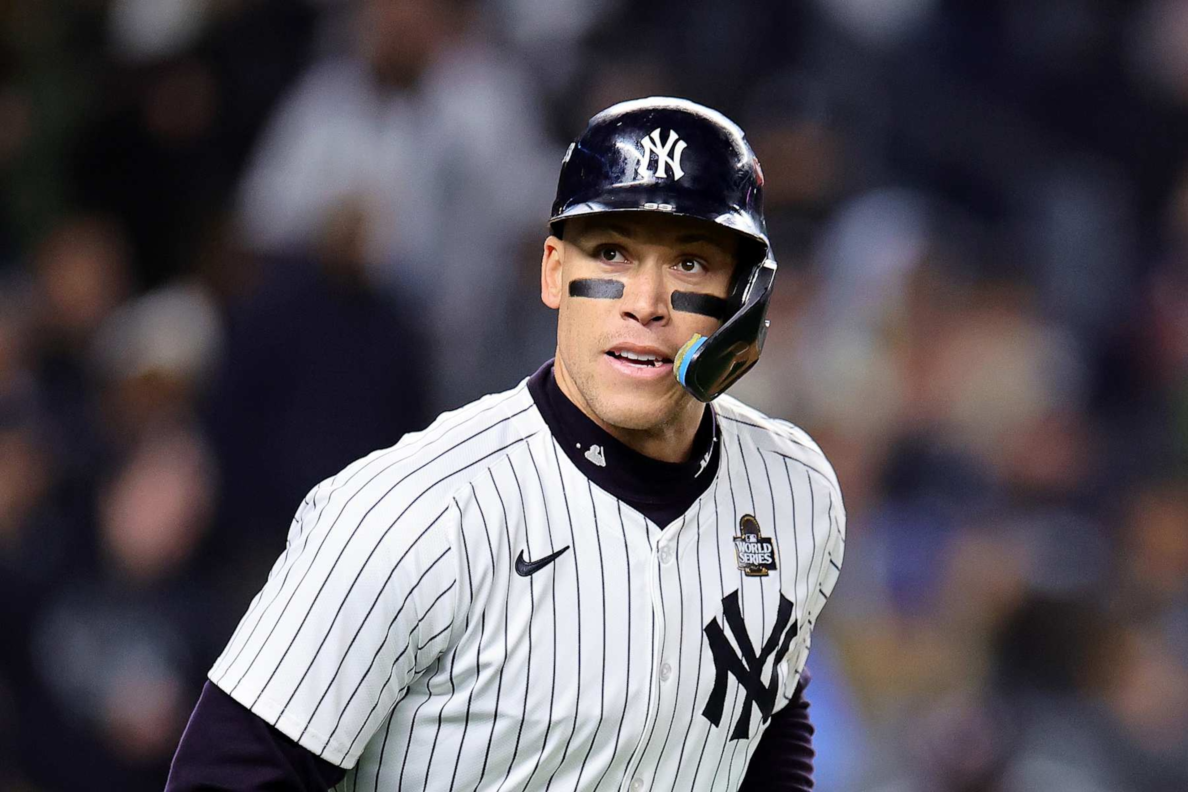 NEW YORK, NEW YORK - OCTOBER 28: Aaron Judge #99 of the New York Yankees reacts after being walked in the eighth inning against the Los Angeles Dodgers during Game Three of the 2024 World Series at Yankee Stadium on October 28, 2024 in the Bronx borough of New York City. (Photo by Alex Slitz/Getty Images)