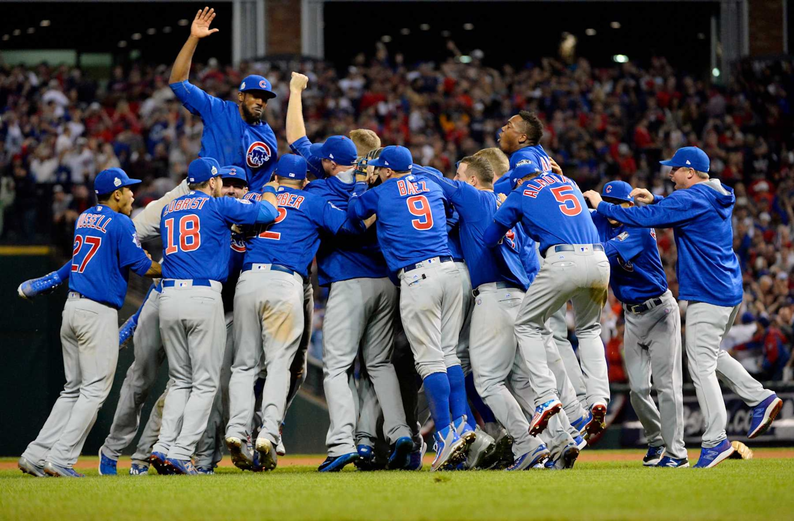 CLEVELAND, OH - NOVEMBER 2: Members of the Chicago Cubs celebrate defeating the Cleveland Indians in Game 7 of the 2016 World Series at Progressive Field on Wednesday, November 2, 2016 in Cleveland, Ohio. (Photo by Ron Vesely/MLB via Getty Images) CLEVELAND, OH - NOVEMBER 2: Members of the Chicago Cubs celebrate defeating the Cleveland Indians in Game 7 of the 2016 World Series at Progressive Field on Wednesday, November 2, 2016 in Cleveland, Ohio. (Photo by Ron Vesely/MLB via Getty Images)
