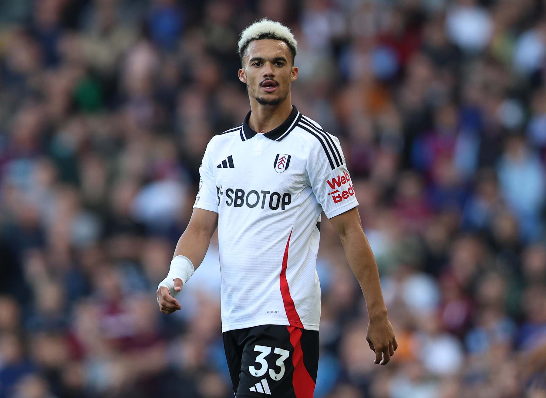 LONDON, ENGLAND - OCTOBER 19: Antonee Robinson of Fulham during the Premier League match between Fulham FC and Aston Villa FC at Craven Cottage on October 19, 2024 in London, England. (Photo by Crystal Pix/MB Media/Getty Images)