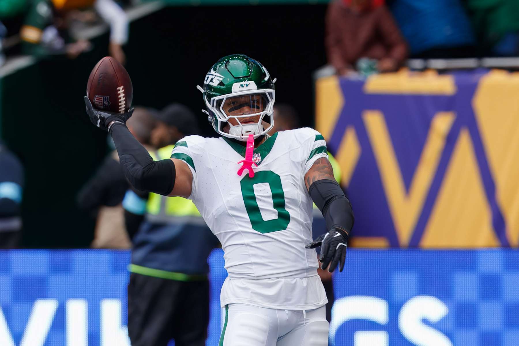 London, United Kingdom - October 6: Braelon Allen of New York Jets controls the ball during the NFL match between New York Jets and Minnesota Vikings at Tottenham Hotspur Stadium on October 6, 2024 in London, England. (Photo by Mario Hommes/DeFodi Images via Getty Images)