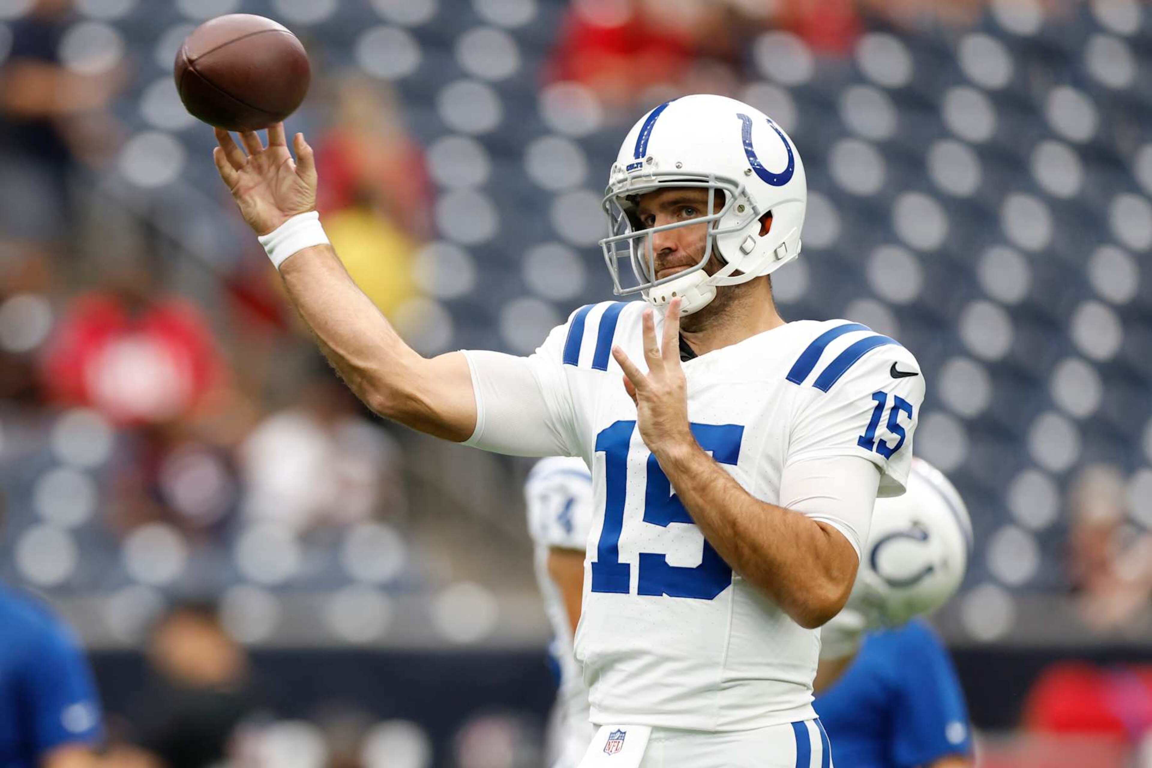 HOUSTON, TEXAS - OCTOBER 27: Joe Flacco #15 of the Indianapolis Colts warms up prior to the game against the Houston Texans at NRG Stadium on October 27, 2024 in Houston, Texas. (Photo by Tim Warner/Getty Images)