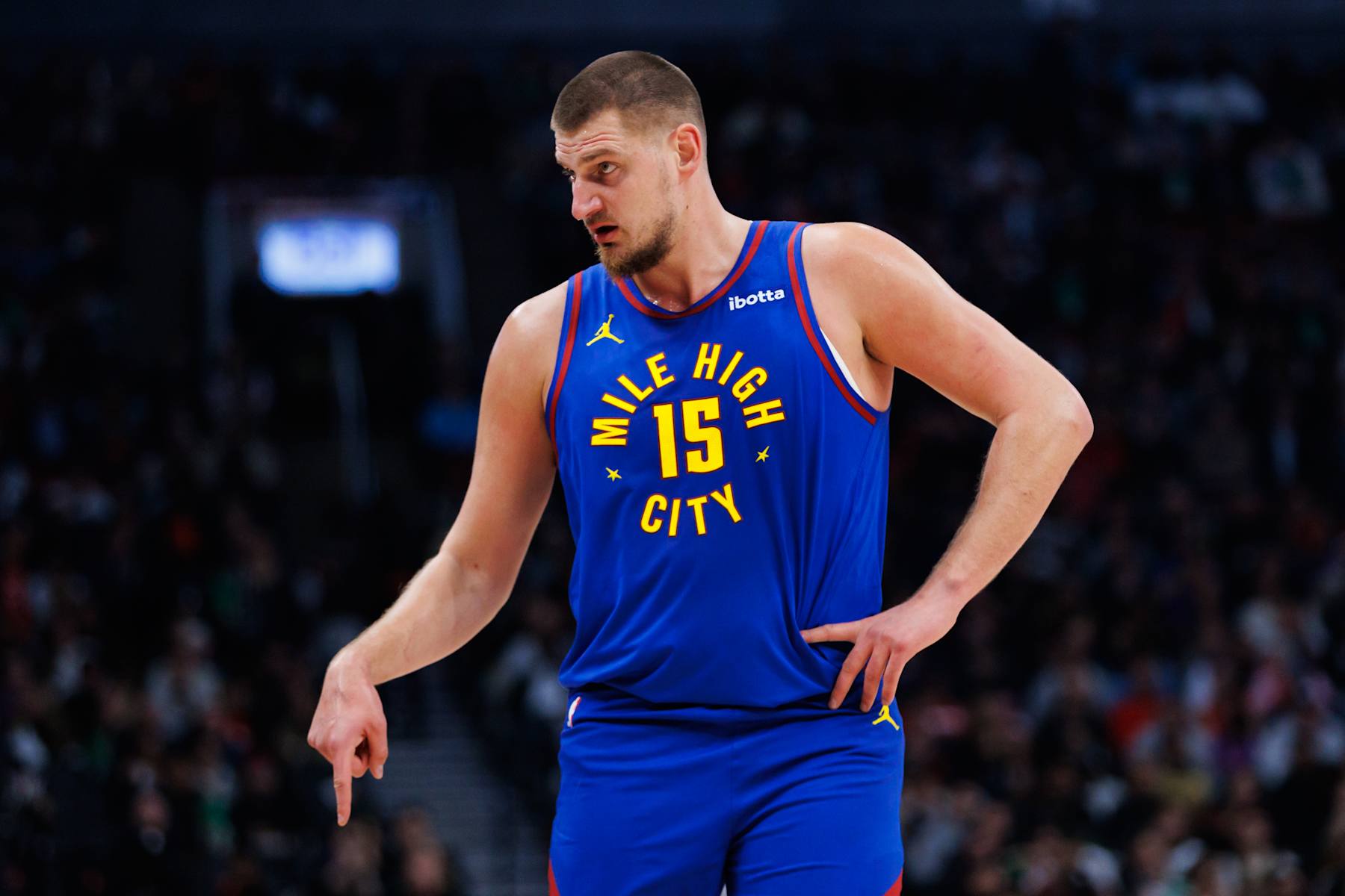 TORONTO, CANADA - OCTOBER 28: Nikola Jokic #15 of the Denver Nuggets reacts during the first half of their NBA game against the Toronto Raptors at Scotiabank Arena on October 28, 2024 in Toronto, Ontario, Canada. NOTE TO USER: User expressly acknowledges and agrees that, by downloading and or using this photograph, User is consenting to the terms and conditions of the Getty Images License Agreement. (Photo by Cole Burston/Getty Images)