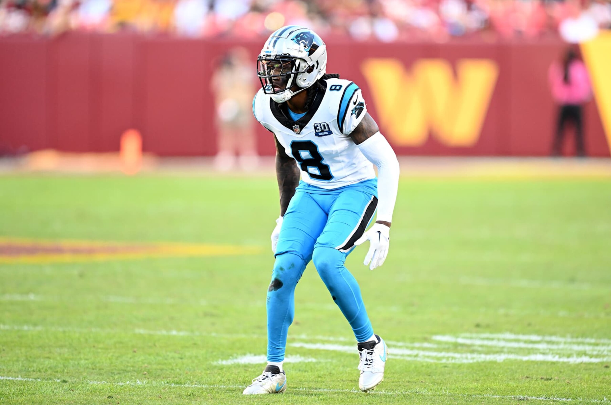LANDOVER, MARYLAND - OCTOBER 20: Jaycee Horn #8 of the Carolina Panthers defends against the Washington Commanders at Northwest Stadium on October 20, 2024 in Landover, Maryland. (Photo by G Fiume/Getty Images)
