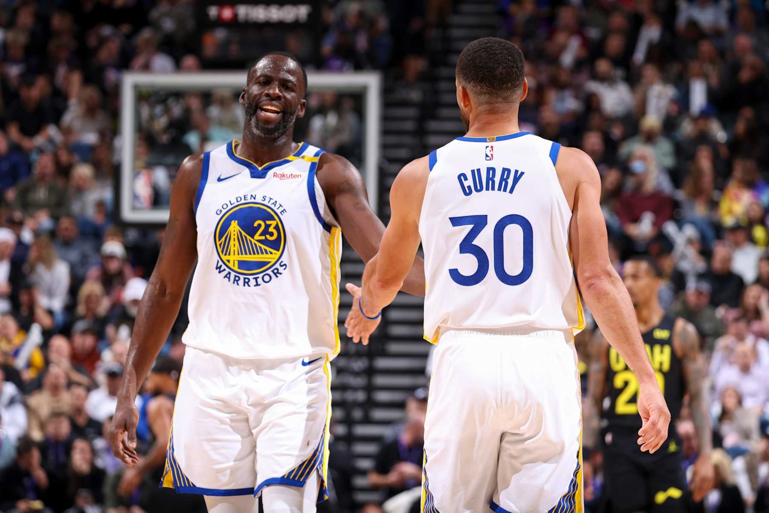 SALT LAKE CITY, UT - OCTOBER 25: Draymond Green #23 and Stephen Curry #30 of the Golden State Warriors high five during the game on October 25, 2024 at Delta Center in Salt Lake City, Utah. NOTE TO USER: User expressly acknowledges and agrees that, by downloading and or using this Photograph, User is consenting to the terms and conditions of the Getty Images License Agreement. Mandatory Copyright Notice: Copyright 2024 NBAE (Photo by Melissa Majchrzak/NBAE via Getty Images) SALT LAKE CITY, UT - OCTOBER 25: Draymond Green #23 and Stephen Curry #30 of the Golden State Warriors high five during the game on October 25, 2024 at Delta Center in Salt Lake City, Utah. NOTE TO USER: User expressly acknowledges and agrees that, by downloading and or using this Photograph, User is consenting to the terms and conditions of the Getty Images License Agreement. Mandatory Copyright Notice: Copyright 2024 NBAE (Photo by Melissa Majchrzak/NBAE via Getty Images)