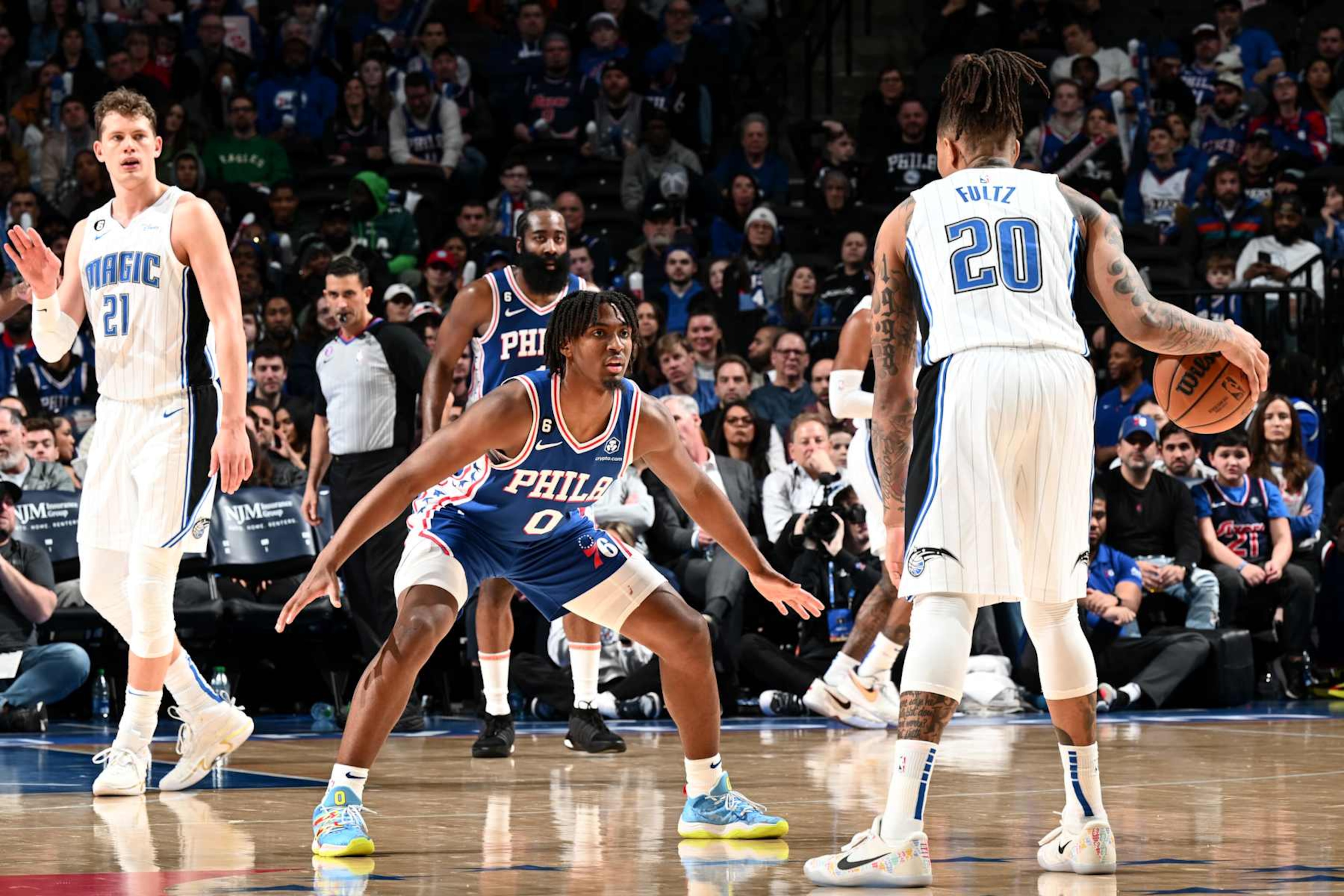 PHILADELPHIA, PA - JANUARY 30: Tyrese Maxey #0 of the Philadelphia 76ers plays defense against Markelle Fultz #20 of the Orlando Magic during the game on January 30, 2023 at the Wells Fargo Center in Philadelphia, Pennsylvania NOTE TO USER: User expressly acknowledges and agrees that, by downloading and/or using this Photograph, user is consenting to the terms and conditions of the Getty Images License Agreement. Mandatory Copyright Notice: Copyright 2023 NBAE (Photo by David Dow/NBAE via Getty Images) PHILADELPHIA, PA - JANUARY 30: Tyrese Maxey #0 of the Philadelphia 76ers plays defense against Markelle Fultz #20 of the Orlando Magic during the game on January 30, 2023 at the Wells Fargo Center in Philadelphia, Pennsylvania NOTE TO USER: User expressly acknowledges and agrees that, by downloading and/or using this Photograph, user is consenting to the terms and conditions of the Getty Images License Agreement. Mandatory Copyright Notice: Copyright 2023 NBAE (Photo by David Dow/NBAE via Getty Images)