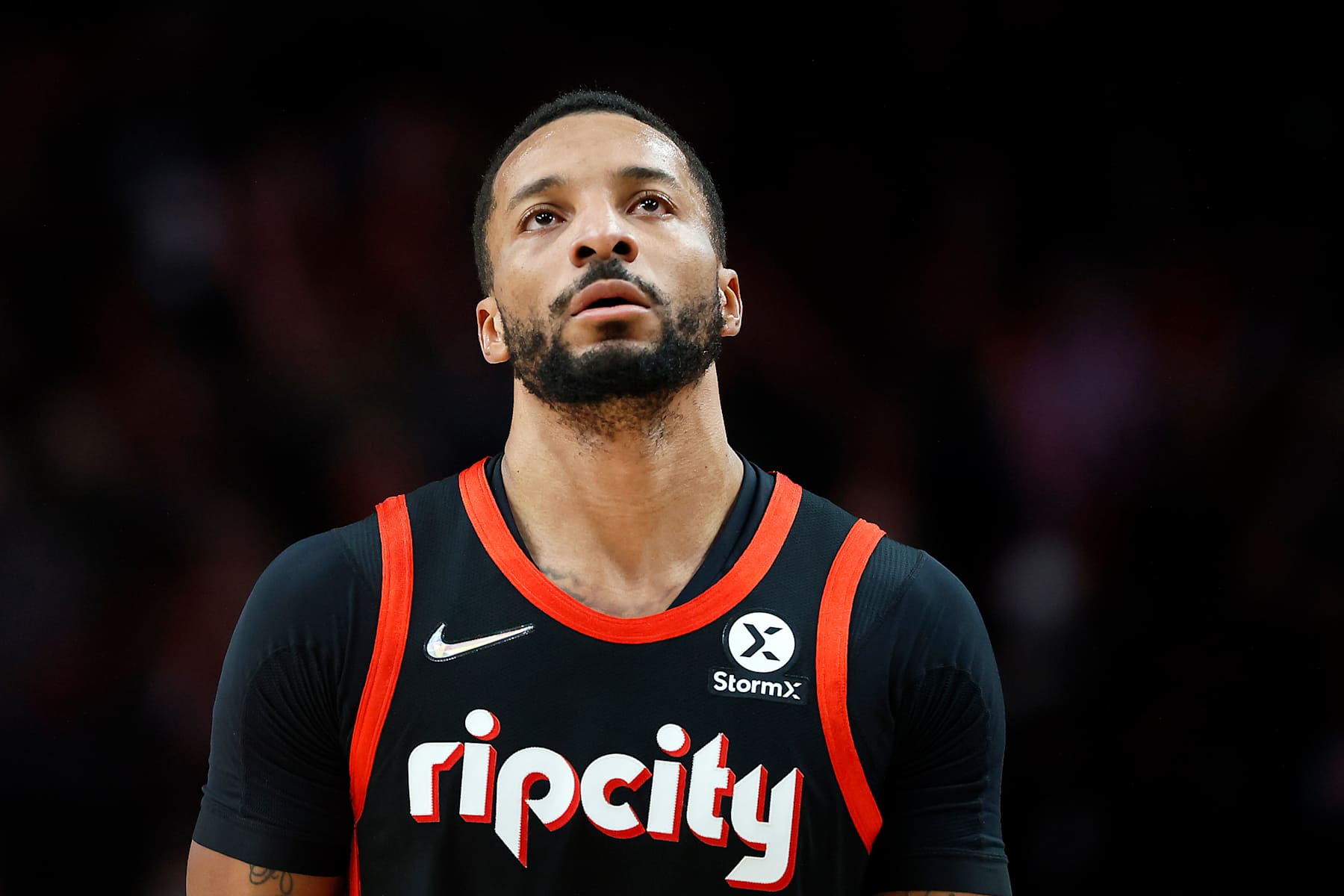 PORTLAND, OREGON - DECEMBER 29: Norman Powell # 24 of the Portland Trail Blazers reacts during the second half against the Utah Jazz at Moda Center on December 29, 2021 in Portland, Oregon. NOTE TO USER: User expressly acknowledges and agrees that, by downloading and or using this photograph, User is consenting to the terms and conditions of the Getty Images License Agreement. (Photo by Soobum Im/Getty Images)