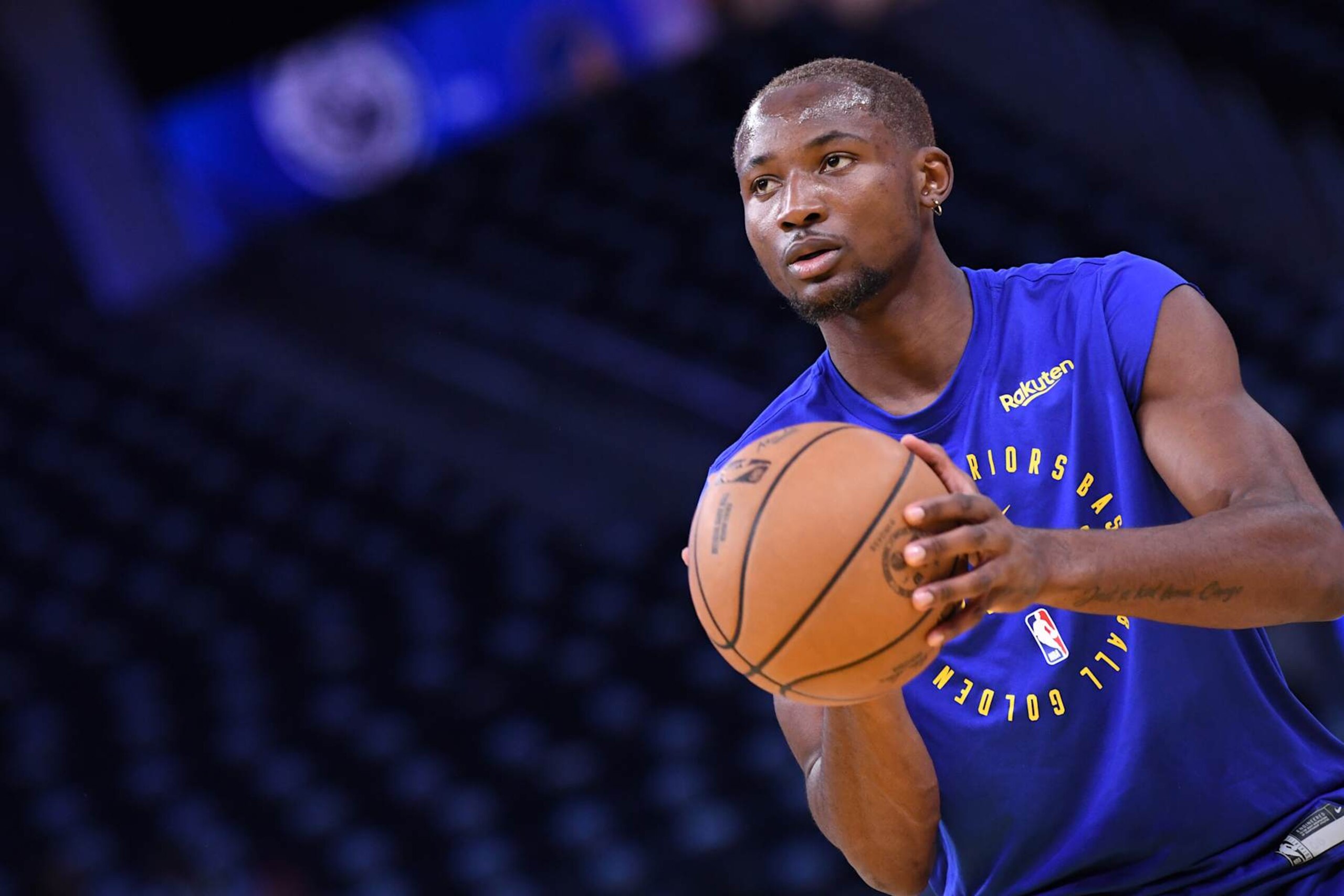 SAN FRANCISCO, CA - OCTOBER 27: Jonathan Kuminga #00 of the Golden State Warriors warms up before the game against the LA Clippers on October 27, 2024 at Chase Center in San Francisco, California. NOTE TO USER: User expressly acknowledges and agrees that, by downloading and or using this photograph, user is consenting to the terms and conditions of Getty Images License Agreement. Mandatory Copyright Notice: Copyright 2024 NBAE (Photo by Noah Graham/NBAE via Getty Images) SAN FRANCISCO, CA - OCTOBER 27: Jonathan Kuminga #00 of the Golden State Warriors warms up before the game against the LA Clippers on October 27, 2024 at Chase Center in San Francisco, California. NOTE TO USER: User expressly acknowledges and agrees that, by downloading and or using this photograph, user is consenting to the terms and conditions of Getty Images License Agreement. Mandatory Copyright Notice: Copyright 2024 NBAE (Photo by Noah Graham/NBAE via Getty Images)
