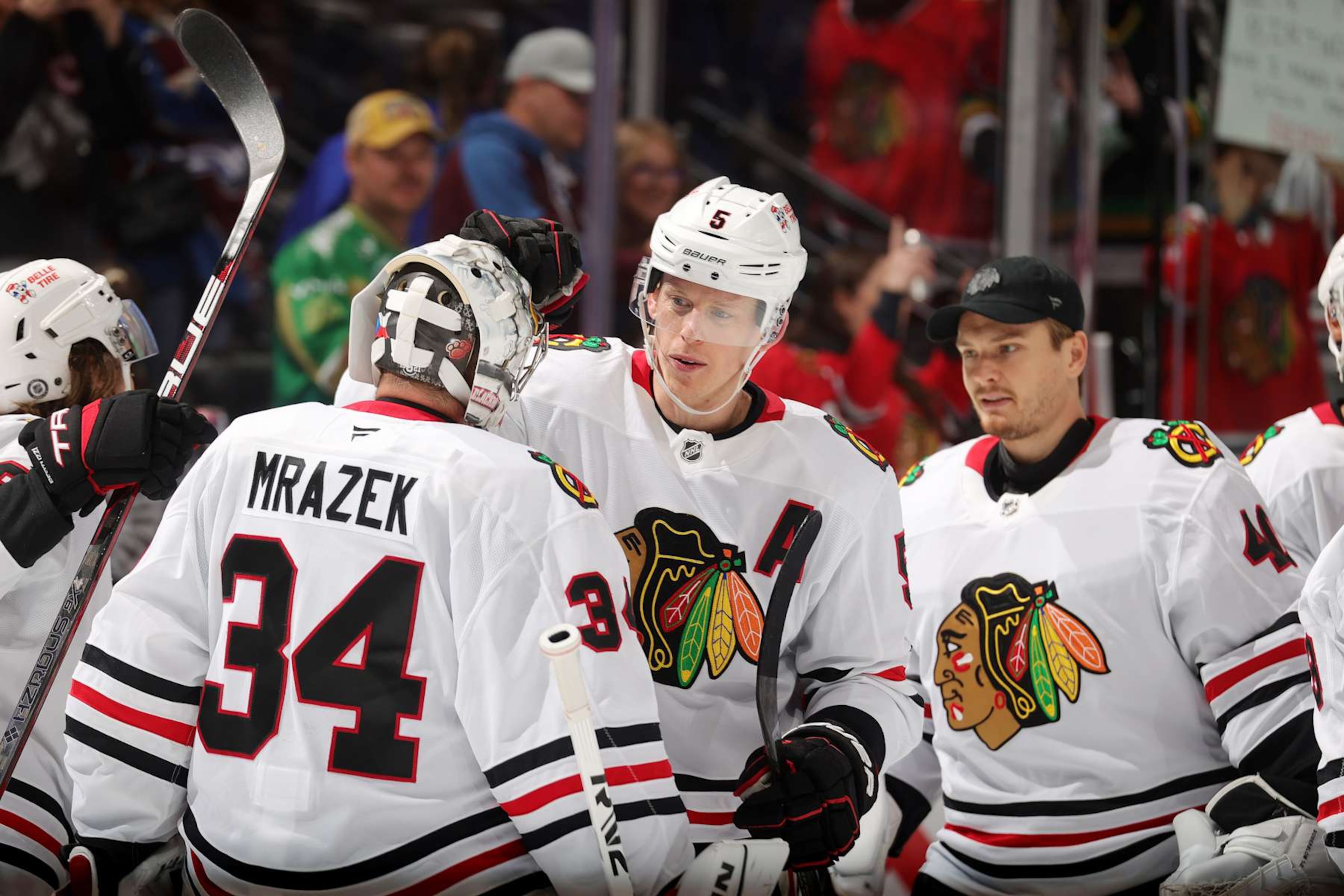 DENVER, COLORADO - OCTOBER 28: Goaltender Petr Mrazek #34 and Connor Murphy #5 of the Chicago Blackhawks celebrate a win against the Colorado Avalanche at Ball Arena on October 28, 2024 in Denver, Colorado. (Photo by Michael Martin/NHLI via Getty Images) DENVER, COLORADO - OCTOBER 28: Goaltender Petr Mrazek #34 and Connor Murphy #5 of the Chicago Blackhawks celebrate a win against the Colorado Avalanche at Ball Arena on October 28, 2024 in Denver, Colorado. (Photo by Michael Martin/NHLI via Getty Images)