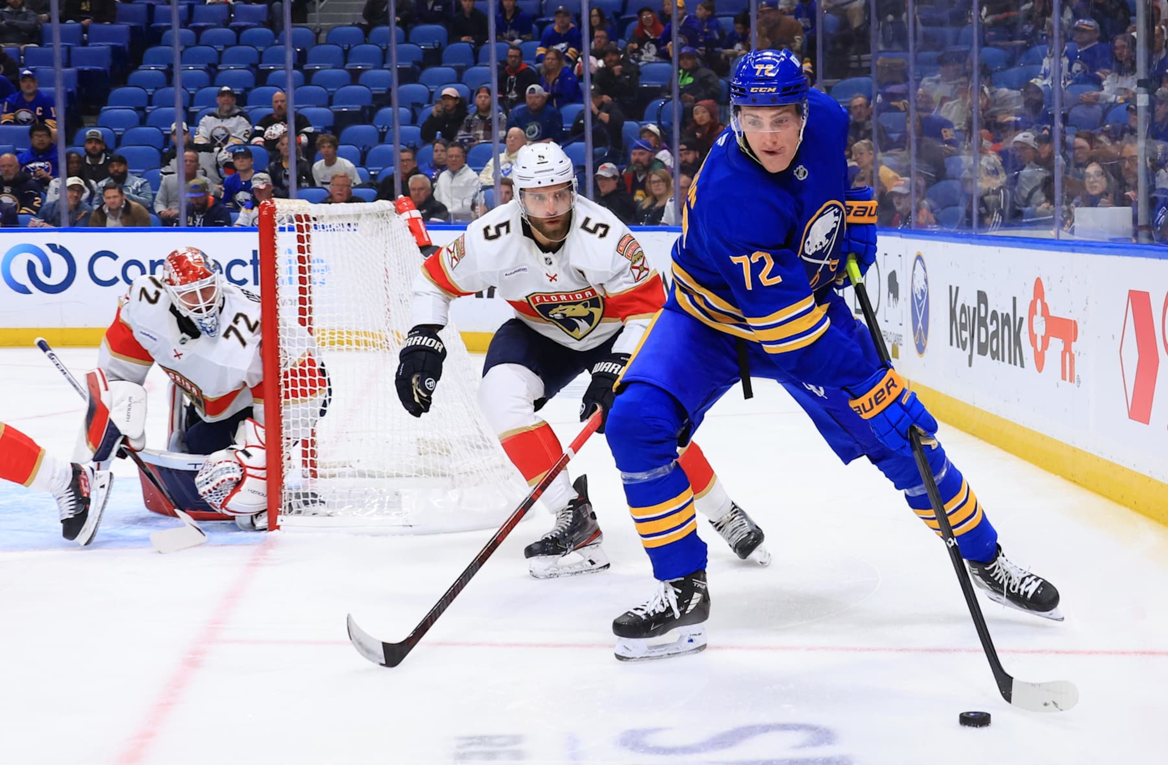 BUFFALO, NEW YORK - OCTOBER 28: Tage Thompson #72 of the Buffalo Sabres controls the puck as Aaron Ekblad #5 and Sergei Bobrovsky #72 of the Florida Panthers defend during an NHL game on October 28, 2024 at KeyBank Center in Buffalo, New York. (Photo by Bill Wippert/NHLI via Getty Images) BUFFALO, NEW YORK - OCTOBER 28: Tage Thompson #72 of the Buffalo Sabres controls the puck as Aaron Ekblad #5 and Sergei Bobrovsky #72 of the Florida Panthers defend during an NHL game on October 28, 2024 at KeyBank Center in Buffalo, New York. (Photo by Bill Wippert/NHLI via Getty Images)