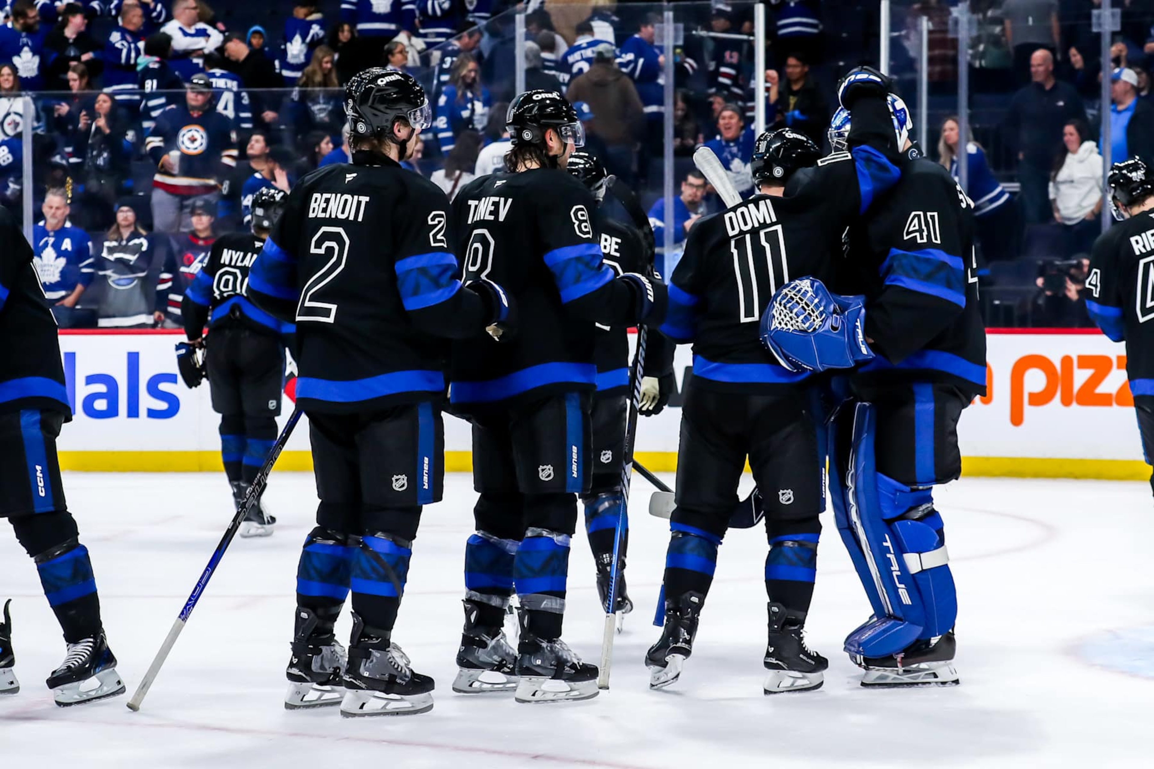 WINNIPEG, CANADA - OCTOBER 28: Toronto Maple Leafs players celebrate on the ice following a 6-4 victory over the Winnipeg Jets at the Canada Life Centre on October 28, 2024 in Winnipeg, Manitoba, Canada. (Photo by Darcy Finley/NHLI via Getty Images) WINNIPEG, CANADA - OCTOBER 28: Toronto Maple Leafs players celebrate on the ice following a 6-4 victory over the Winnipeg Jets at the Canada Life Centre on October 28, 2024 in Winnipeg, Manitoba, Canada. (Photo by Darcy Finley/NHLI via Getty Images)