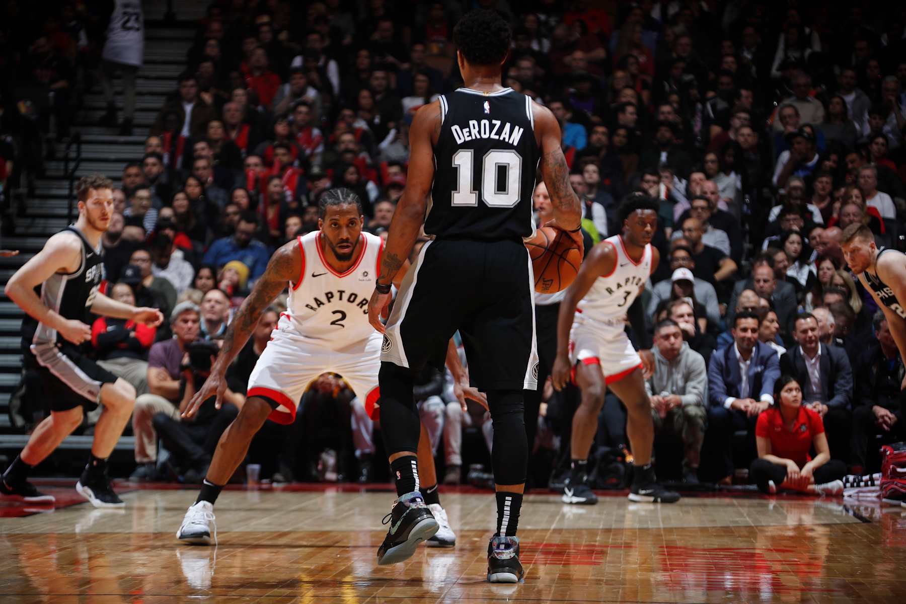 TORONTO, CANADA - FEBRUARY 22: DeMar DeRozan #10 of the San Antonio Spurs handles the ball against Kawhi Leonard #2 of the Toronto Raptors on February 22, 2019 at the Scotiabank Arena in Toronto, Ontario, Canada.  NOTE TO USER: User expressly acknowledges and agrees that, by downloading and or using this Photograph, user is consenting to the terms and conditions of the Getty Images License Agreement.  Mandatory Copyright Notice: Copyright 2019 NBAE (Photo by Mark Blinch/NBAE via Getty Images)