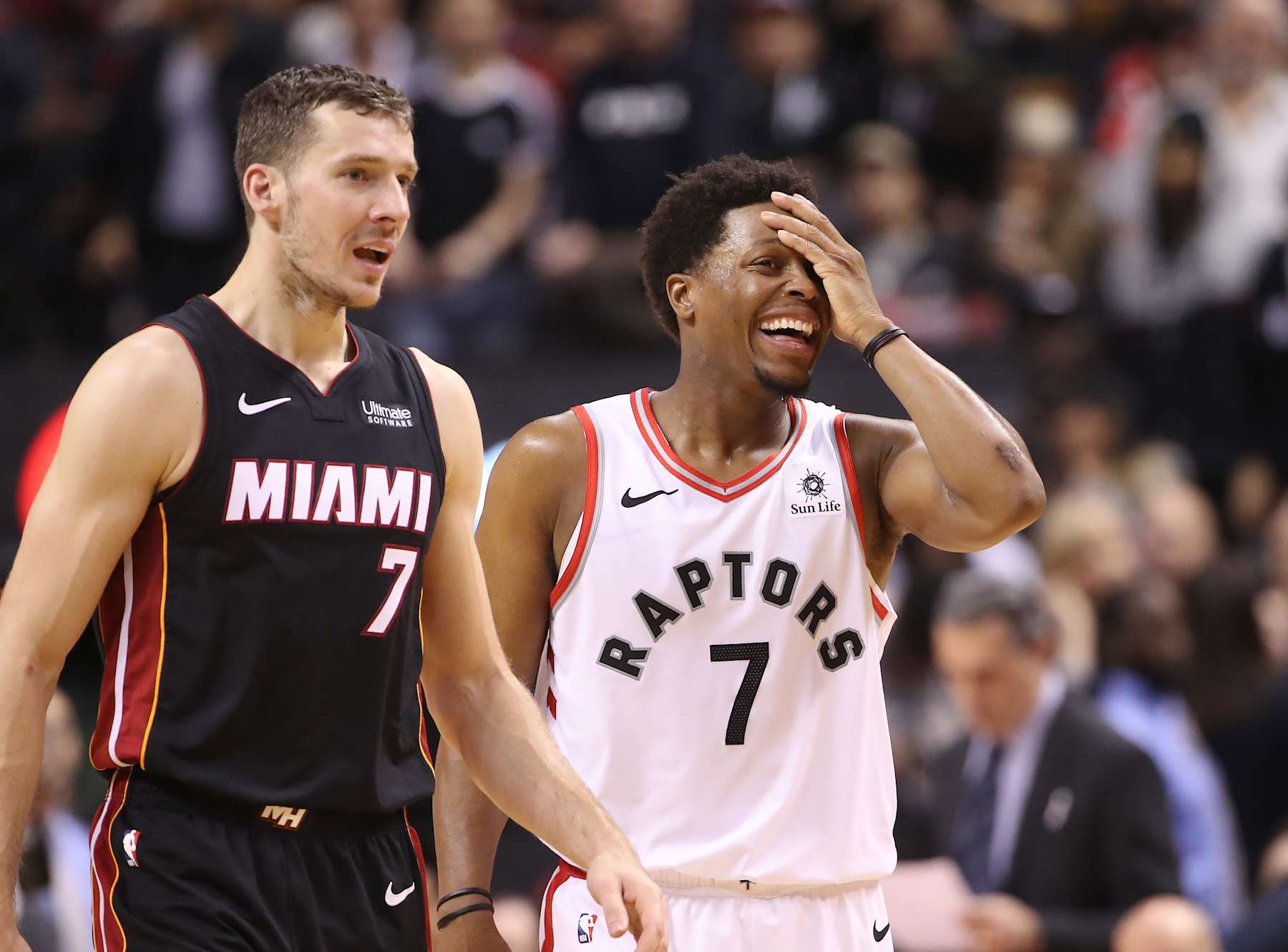 TORONTO, ON - APRIL 07: Kyle Lowry #7 of the Toronto Raptors shares a laugh with Goran Dragic #7 of the Miami Heat at Scotiabank Arena on April 7, 2019 in Toronto, Canada. NOTE TO USER: User expressly acknowledges and agrees that, by downloading and or using this photograph, User is consenting to the terms and conditions of the Getty Images License Agreement. (Photo by Tom Szczerbowski/Getty Images)