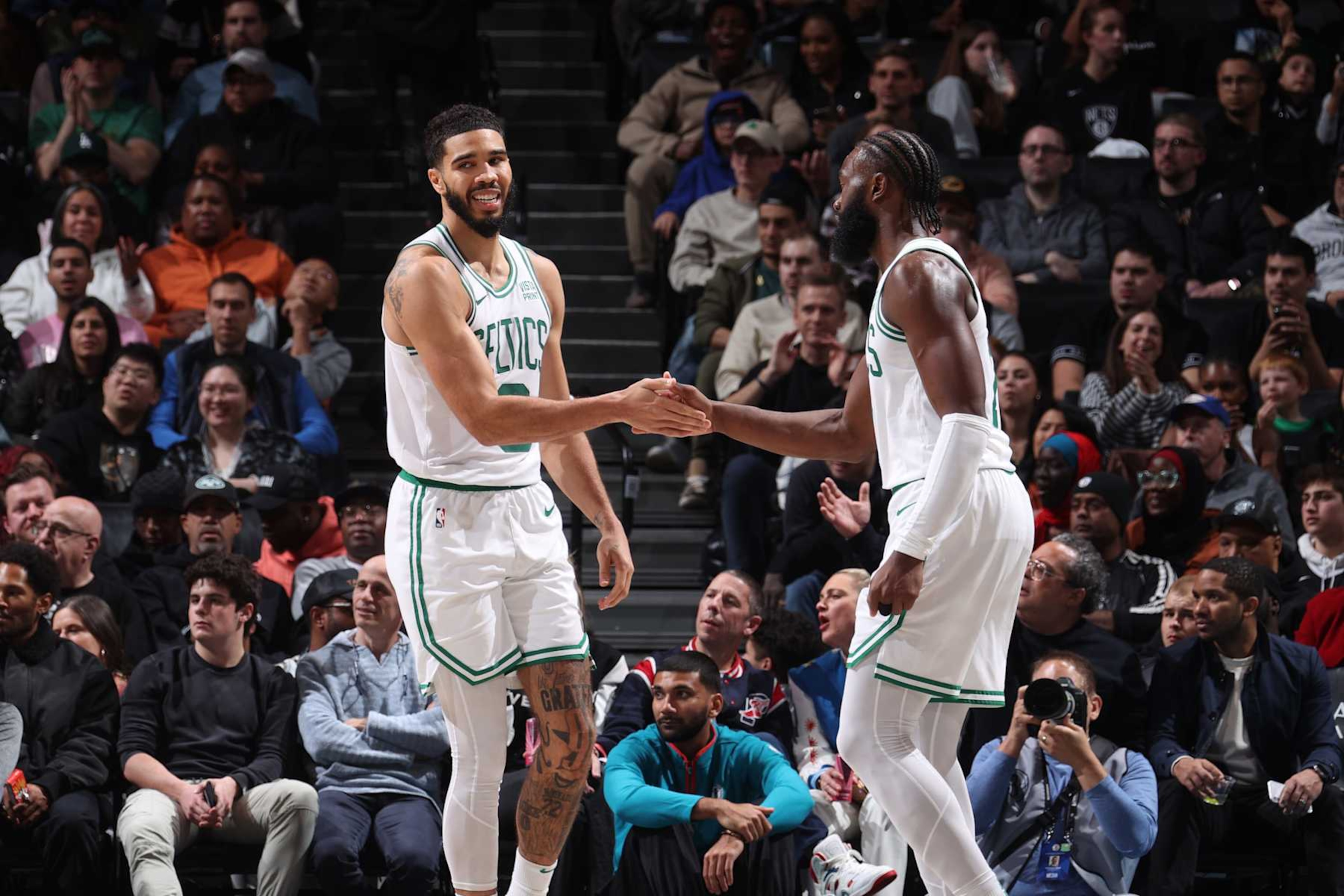 BROOKLYN, NY - NOVEMBER 4: Jayson Tatum #0 and Jaylen Brown #7 of the Boston Celtics high five during the game against the Brooklyn Nets on November 4, 2023 at the Barclays Center in Brooklyn, New York. NOTE TO USER: User expressly acknowledges and agrees that, by downloading and or using this Photograph, user is consenting to the terms and conditions of the Getty Images License Agreement. Mandatory Copyright Notice: Copyright 2023 NBAE (Photo by Nathaniel S. Butler/NBAE via Getty Images) BROOKLYN, NY - NOVEMBER 4: Jayson Tatum #0 and Jaylen Brown #7 of the Boston Celtics high five during the game against the Brooklyn Nets on November 4, 2023 at the Barclays Center in Brooklyn, New York. NOTE TO USER: User expressly acknowledges and agrees that, by downloading and or using this Photograph, user is consenting to the terms and conditions of the Getty Images License Agreement. Mandatory Copyright Notice: Copyright 2023 NBAE (Photo by Nathaniel S. Butler/NBAE via Getty Images)