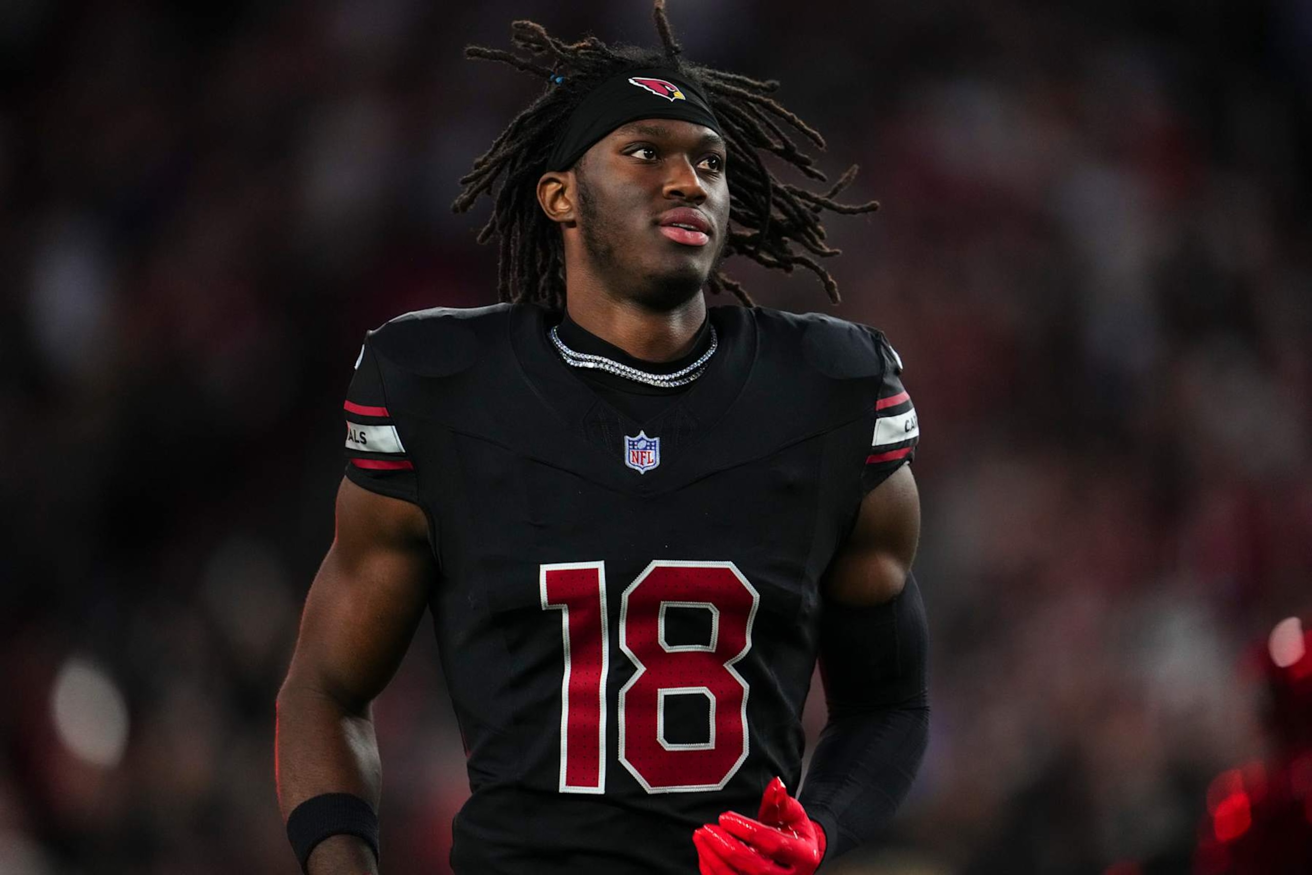 GLENDALE, AZ - OCTOBER 21: Marvin Harrison Jr. #18 of the Arizona Cardinals runs out of the tunnel prior to an NFL football game against the Los Angeles Chargers at State Farm Stadium on October 21, 2024 in Glendale, Arizona. (Photo by Cooper Neill/Getty Images) GLENDALE, AZ - OCTOBER 21: Marvin Harrison Jr. #18 of the Arizona Cardinals runs out of the tunnel prior to an NFL football game against the Los Angeles Chargers at State Farm Stadium on October 21, 2024 in Glendale, Arizona. (Photo by Cooper Neill/Getty Images)