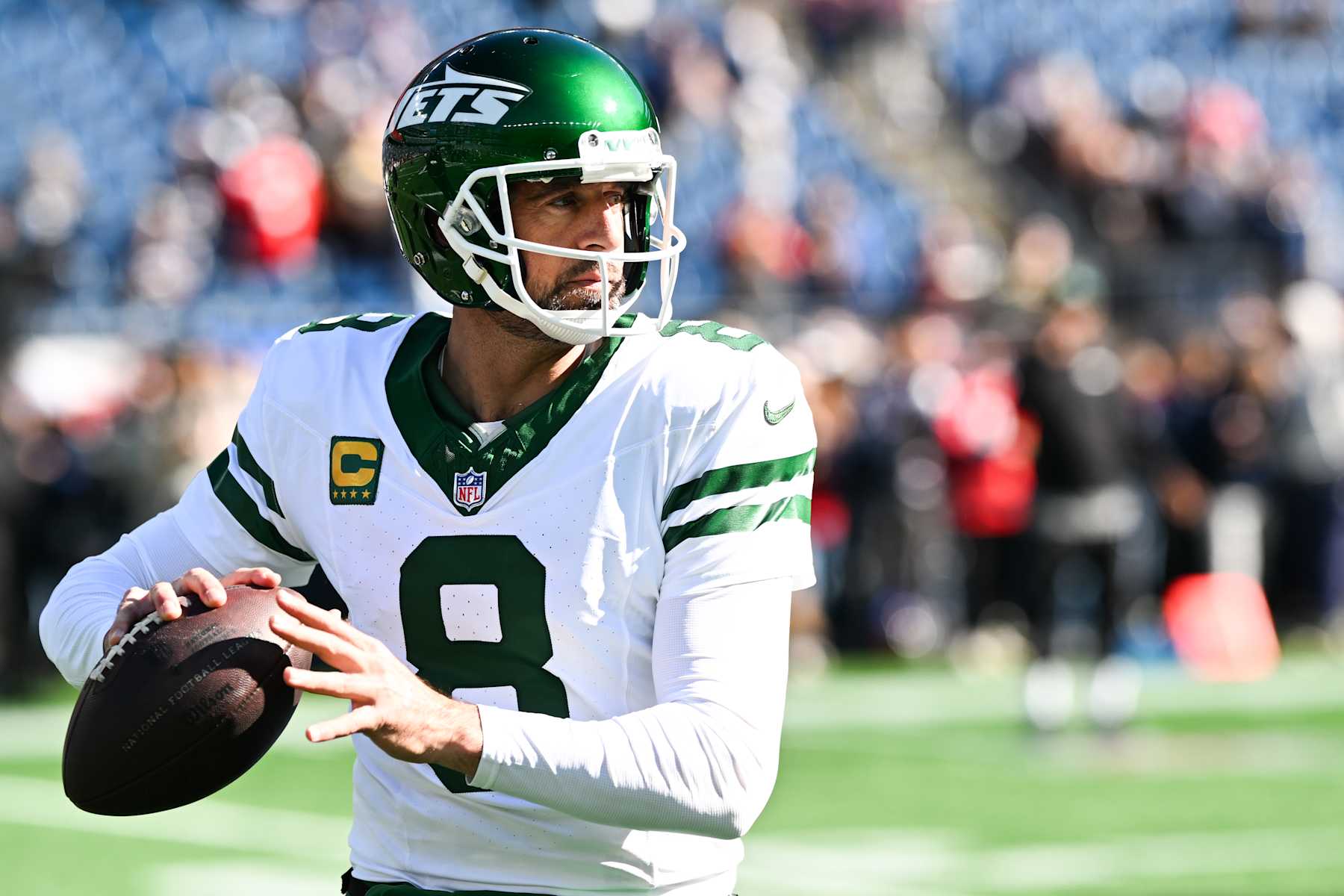 FOXBOROUGH, MASSACHUSETTS - OCTOBER 27: Aaron Rodgers #8 of the New York Jets warms up prior to the start of the game against the New England Patriots at Gillette Stadium on October 27, 2024 in Foxborough, Massachusetts. (Photo by Kathryn Riley/Getty Images)