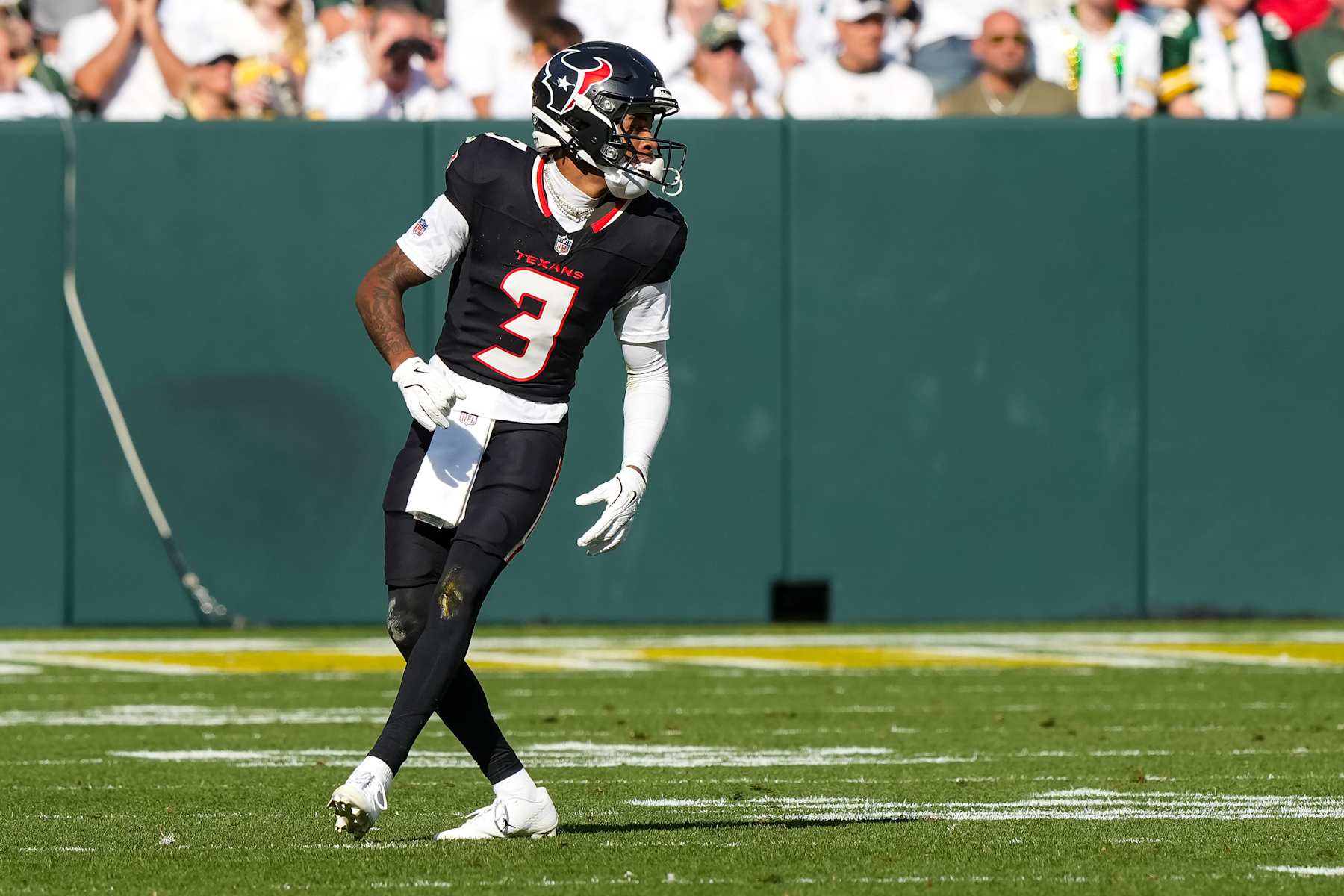 GREEN BAY, WISCONSIN  - OCTOBER 20: Wide receiver Tank Dell #3 of the Houston Texans gets set during the third quarter of an NFL football game against the Green Bay Packers, at Lambeau Field on October 20, 2024 in Green Bay, Wisconsin. (Photo by Todd Rosenberg/Getty Images)