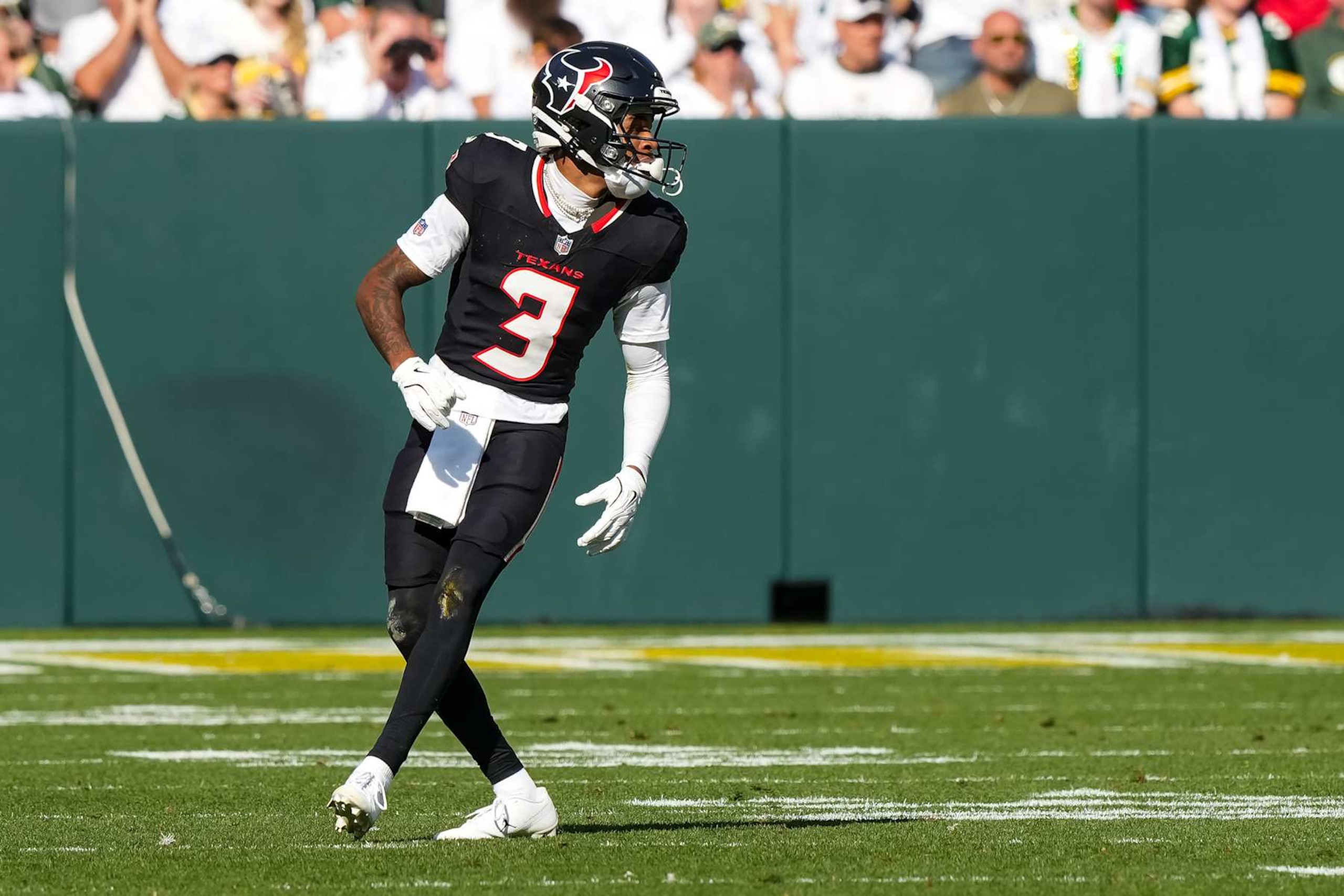 GREEN BAY, WISCONSIN  - OCTOBER 20: Wide receiver Tank Dell #3 of the Houston Texans gets set during the third quarter of an NFL football game against the Green Bay Packers, at Lambeau Field on October 20, 2024 in Green Bay, Wisconsin. (Photo by Todd Rosenberg/Getty Images)