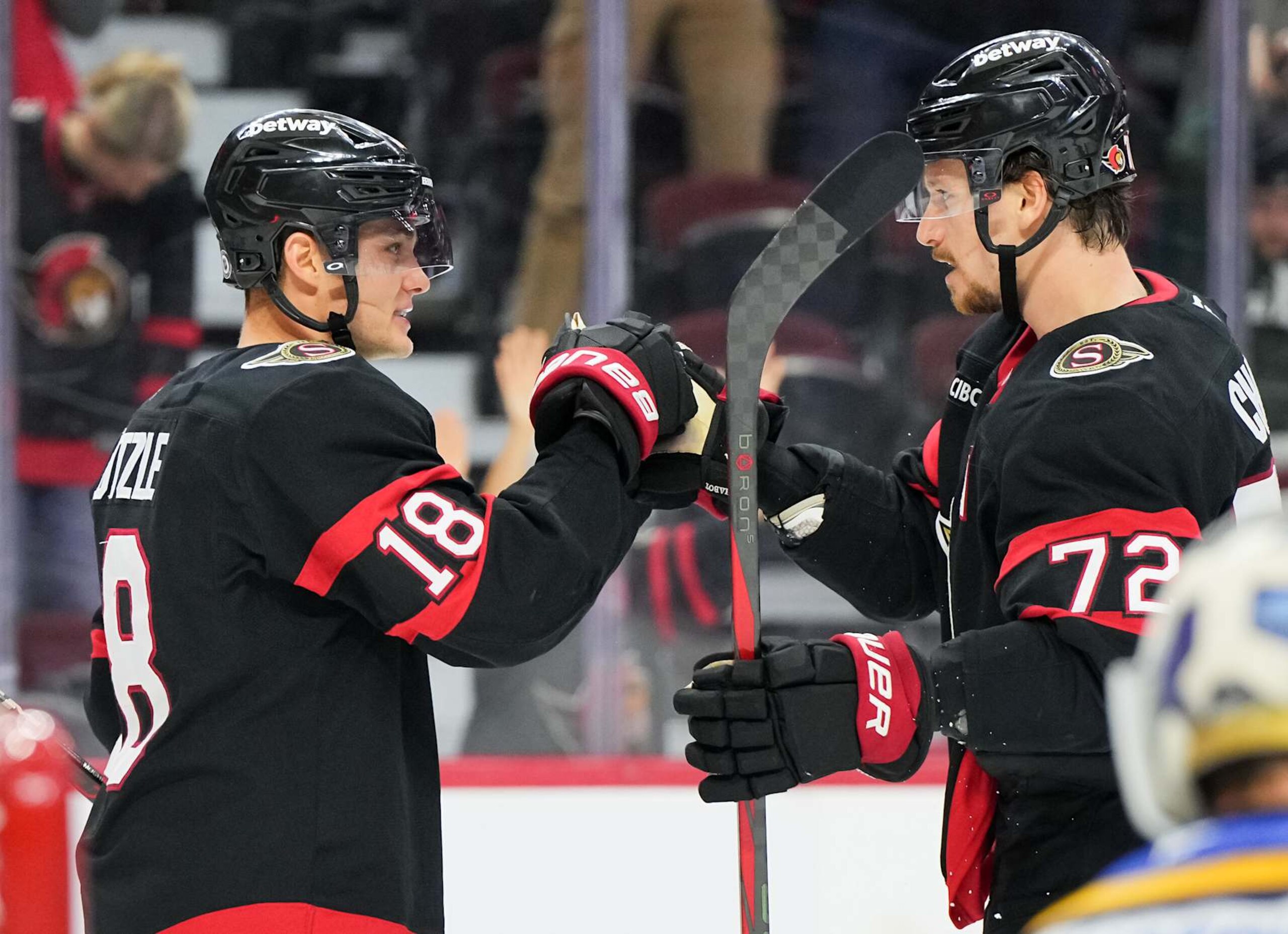 OTTAWA, ON - OCTOBER 29: Tim Stützle #18 of the Ottawa Senators celebrates his third period goal against the St. Louis Blues with teammate Thomas Chabot #72 at Canadian Tire Centre on October 29, 2024 in Ottawa, Ontario, Canada.  (Photo by Matt Zambonin/NHLI via Getty Images)