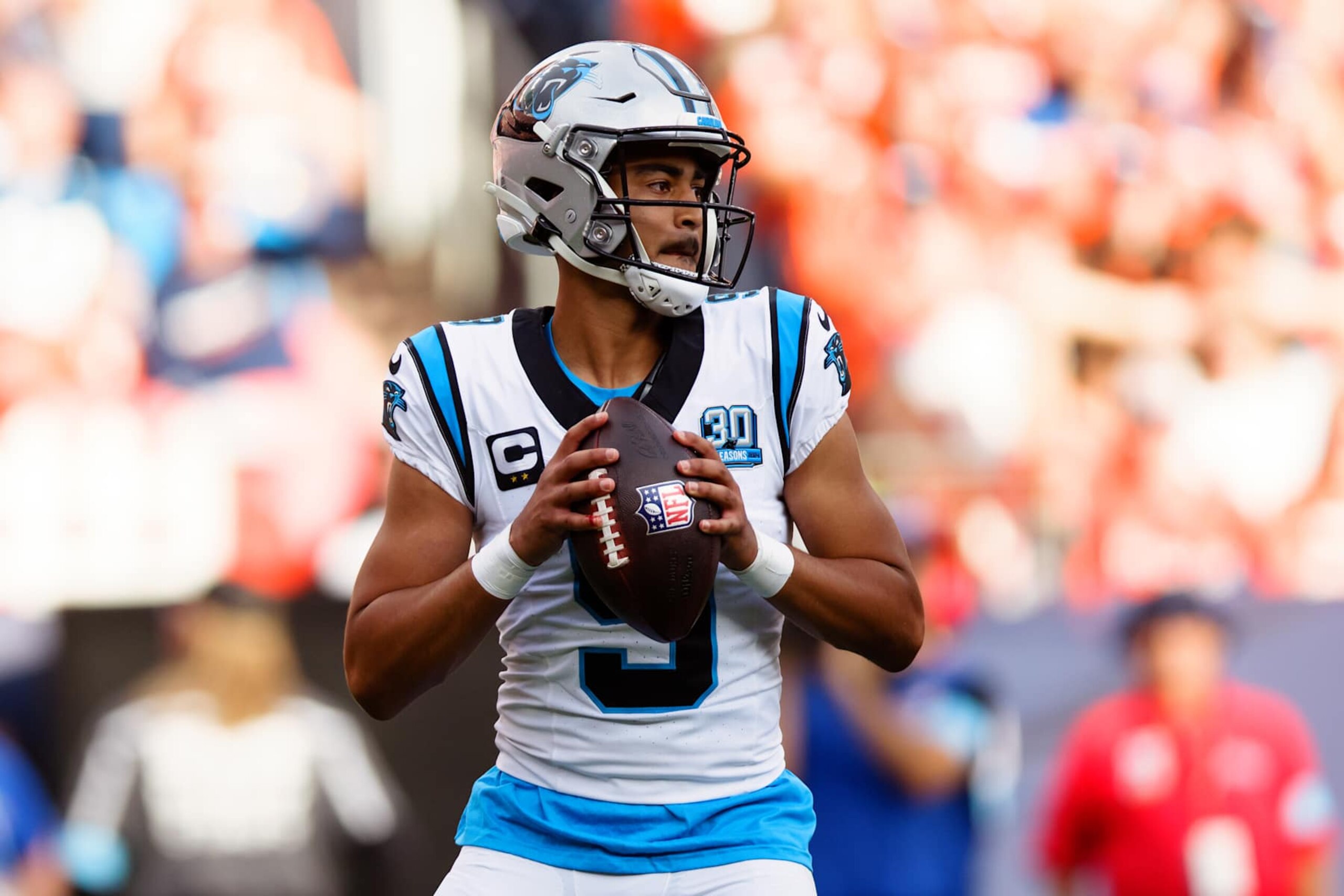 DENVER, CO - OCTOBER 27:  Quarterback Bryce Young #9 of the Carolina Panthers looks to pass during the third quarter against the Denver Broncos at Empower Field at Mile High on October 27, 2024 in Denver, Colorado. (Photo by Justin Edmonds/Getty Images)