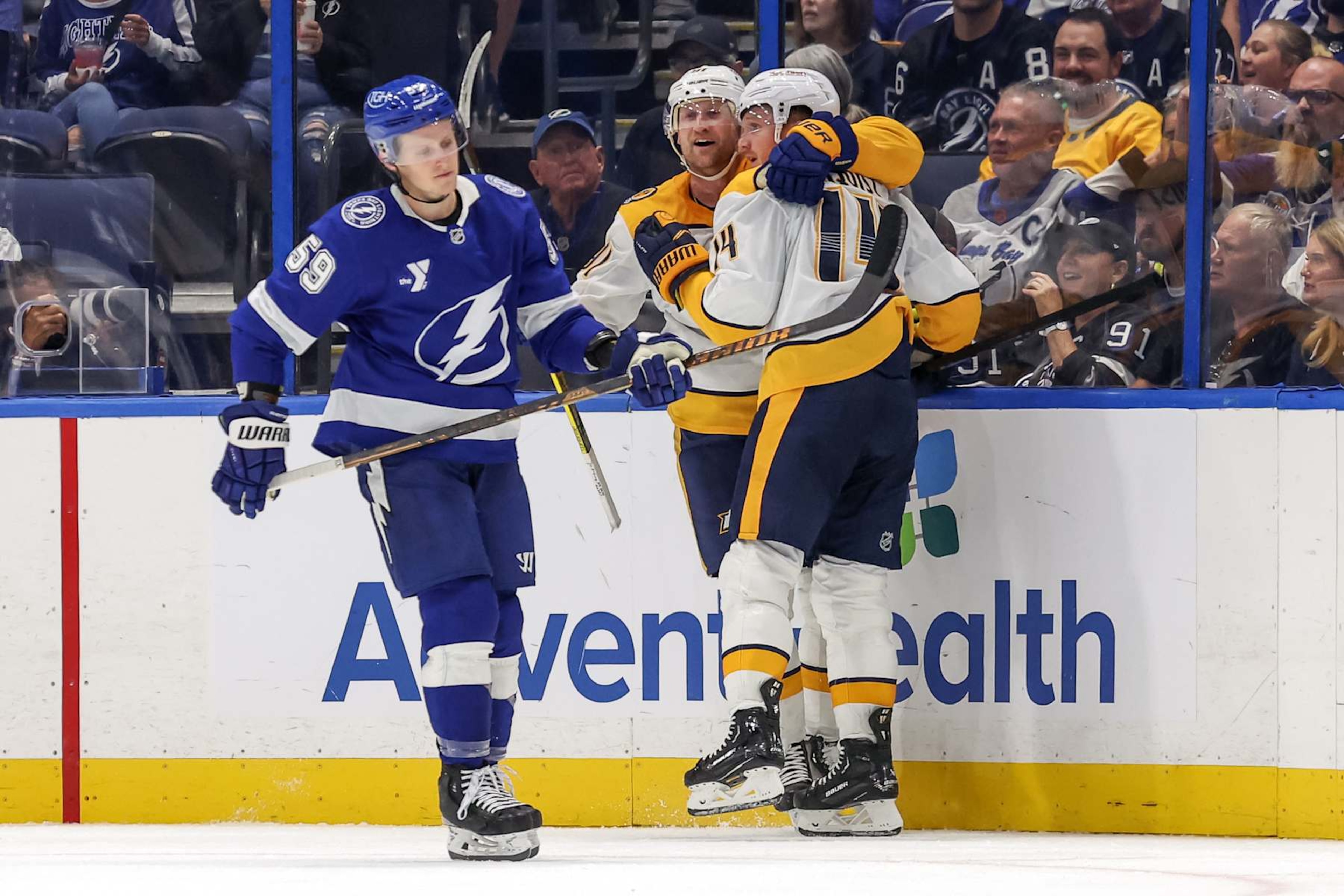 TAMPA, FL - OCTOBER 28: Steven Stamkos #91 of the Nashville Predators celebrates the goal of Gustav Nyquist #14 as Jake Guentzel #59 of the Tampa Bay Lightning reacts during the second period of the game at Amalie Arena on October 28, 2024 in Tampa, Florida. (Photo by Mike Carlson/Getty Images) TAMPA, FL - OCTOBER 28: Steven Stamkos #91 of the Nashville Predators celebrates the goal of Gustav Nyquist #14 as Jake Guentzel #59 of the Tampa Bay Lightning reacts during the second period of the game at Amalie Arena on October 28, 2024 in Tampa, Florida. (Photo by Mike Carlson/Getty Images)