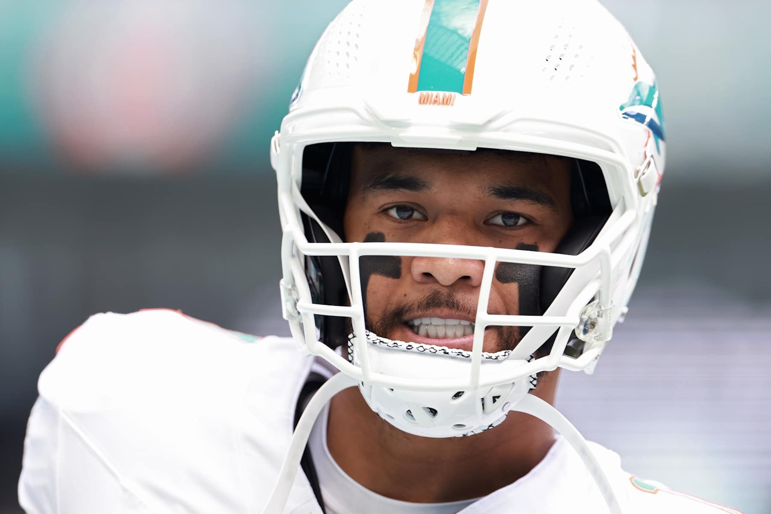 MIAMI GARDENS, FLORIDA - OCTOBER 27: Tua Tagovailoa #1 of the Miami Dolphins looks on prior to a game against the Arizona Cardinals at Hard Rock Stadium on October 27, 2024 in Miami Gardens, Florida. (Photo by Carmen Mandato/Getty Images) MIAMI GARDENS, FLORIDA - OCTOBER 27: Tua Tagovailoa #1 of the Miami Dolphins looks on prior to a game against the Arizona Cardinals at Hard Rock Stadium on October 27, 2024 in Miami Gardens, Florida. (Photo by Carmen Mandato/Getty Images)