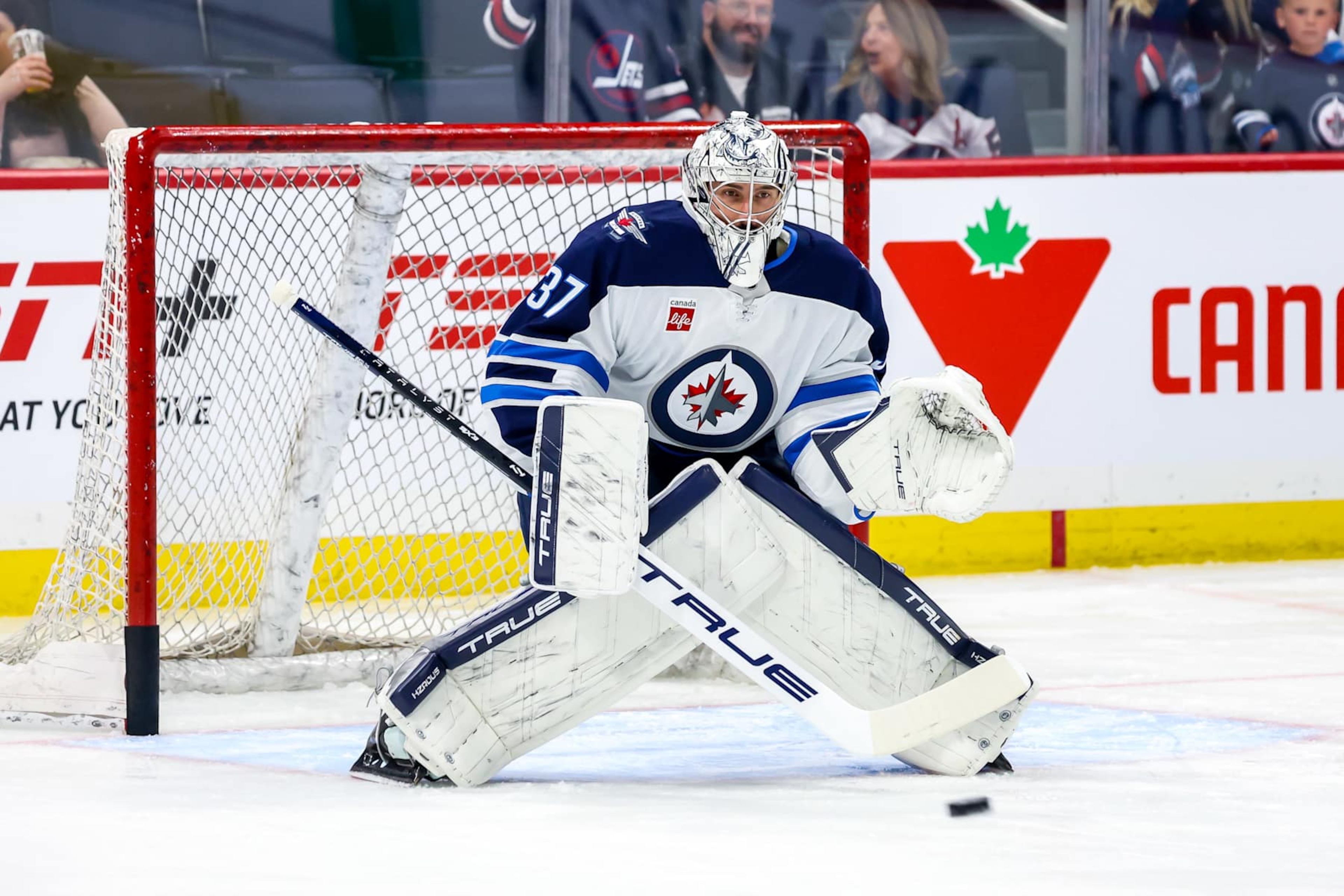WINNIPEG, CANADA - OCTOBER 28: Goaltender Connor Hellebuyck #37 of the Winnipeg Jets takes part in the pre-game warm up prior to NHL action against the Toronto Maple Leafs at the Canada Life Centre on October 28, 2024 in Winnipeg, Manitoba, Canada. (Photo by Jonathan Kozub/NHLI via Getty Images) WINNIPEG, CANADA - OCTOBER 28: Goaltender Connor Hellebuyck #37 of the Winnipeg Jets takes part in the pre-game warm up prior to NHL action against the Toronto Maple Leafs at the Canada Life Centre on October 28, 2024 in Winnipeg, Manitoba, Canada. (Photo by Jonathan Kozub/NHLI via Getty Images)