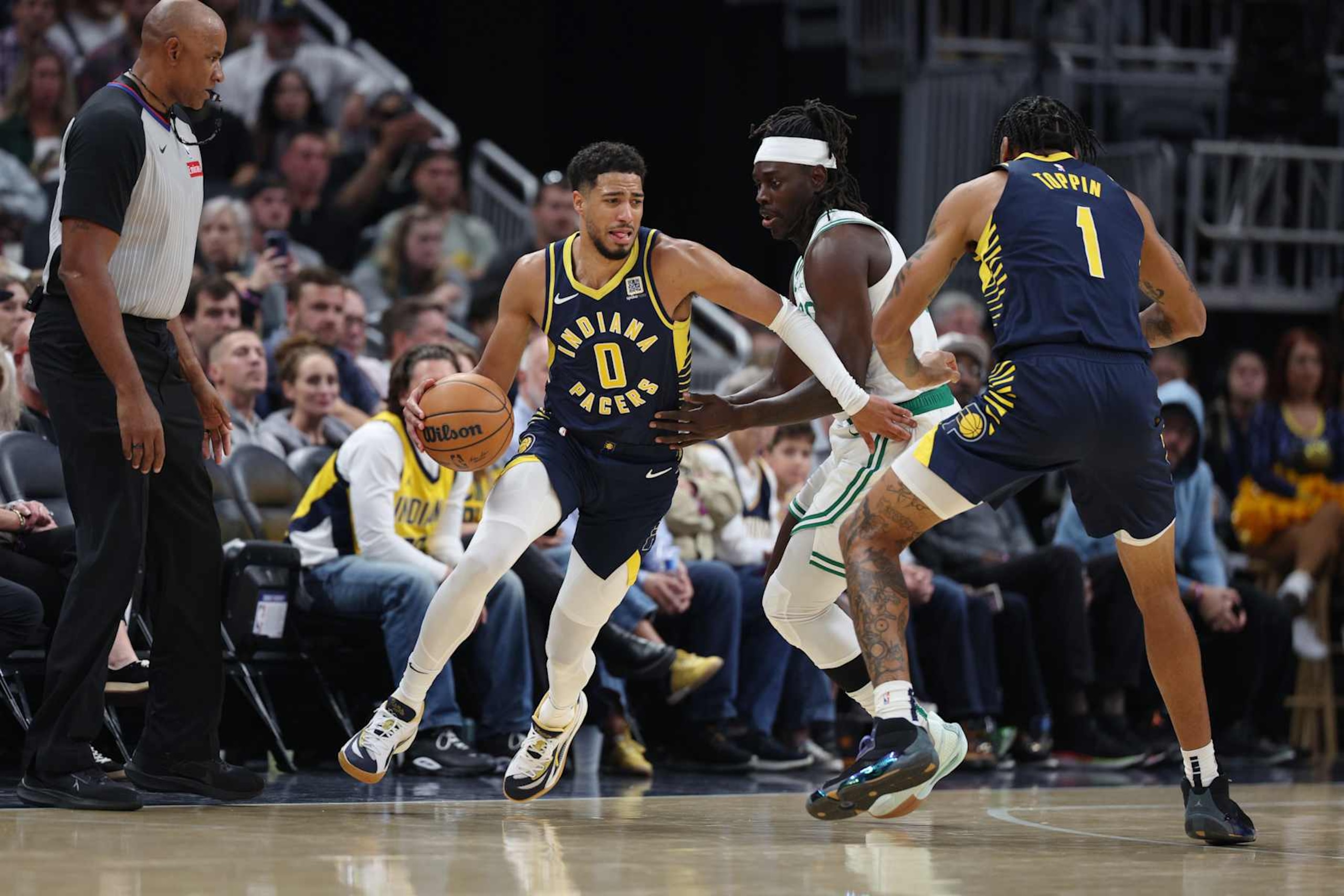 INDIANAPOLIS, IN - OCTOBER 30: Tyrese Haliburton #0 of the Indiana Pacers dribbles the ball during the game against the Boston Celtics on October 30, 2024 at Gainbridge Fieldhouse in Indianapolis, Indiana. NOTE TO USER: User expressly acknowledges and agrees that, by downloading and or using this Photograph, user is consenting to the terms and conditions of the Getty Images License Agreement. Mandatory Copyright Notice: Copyright 2024 NBAE (Photo by Michael Hickey/NBAE via Getty Images)