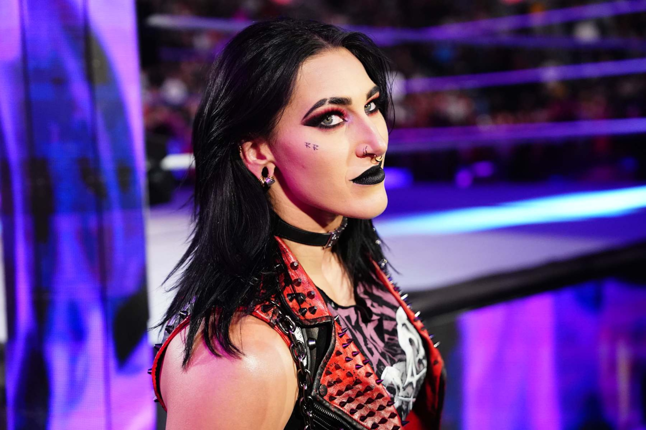 ST LOUIS, MISSOURI - OCTOBER 14: Rhea Ripley makes her entrance during Monday Night RAW at Enterprise Center on October 14, 2024 in St Louis, Missouri. (Photo by WWE/Getty Images) ST LOUIS, MISSOURI - OCTOBER 14: Rhea Ripley makes her entrance during Monday Night RAW at Enterprise Center on October 14, 2024 in St Louis, Missouri. (Photo by WWE/Getty Images)