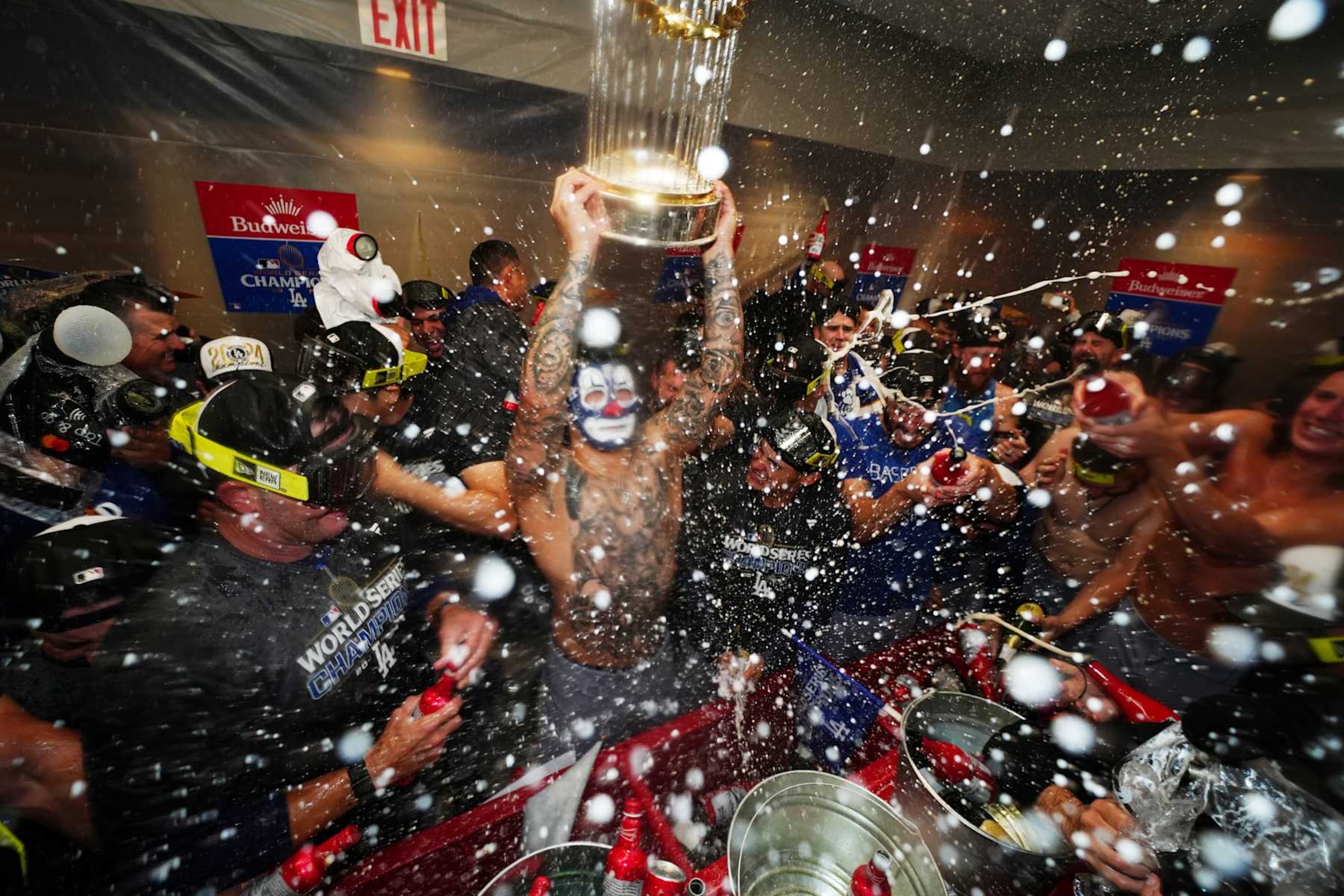 NEW YORK, NY - OCTOBER 30: Anthony Banda #43 of the Los Angeles Dodgers celebrates with teammates in the clubhouse following the Dodgers' 7-6 victory in Game 5 to win the 2024 World Series presented by Capital One between the Los Angeles Dodgers and the New York Yankees at Yankee Stadium on Wednesday, October 30, 2024 in New York, New York. (Photo by Daniel Shirey/MLB Photos via Getty Images)
