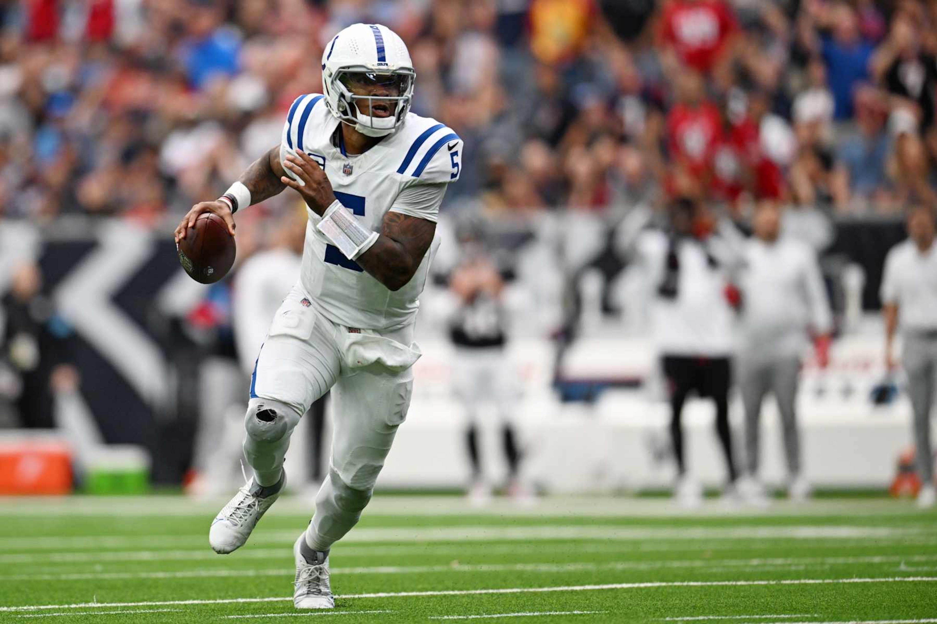 HOUSTON, TEXAS - OCTOBER 27: Anthony Richardson #5 of the Indianapolis Colts runs with the ball during the third quarter against the Houston Texans at NRG Stadium on October 27, 2024 in Houston, Texas. (Photo by Jack Gorman/Getty Images)