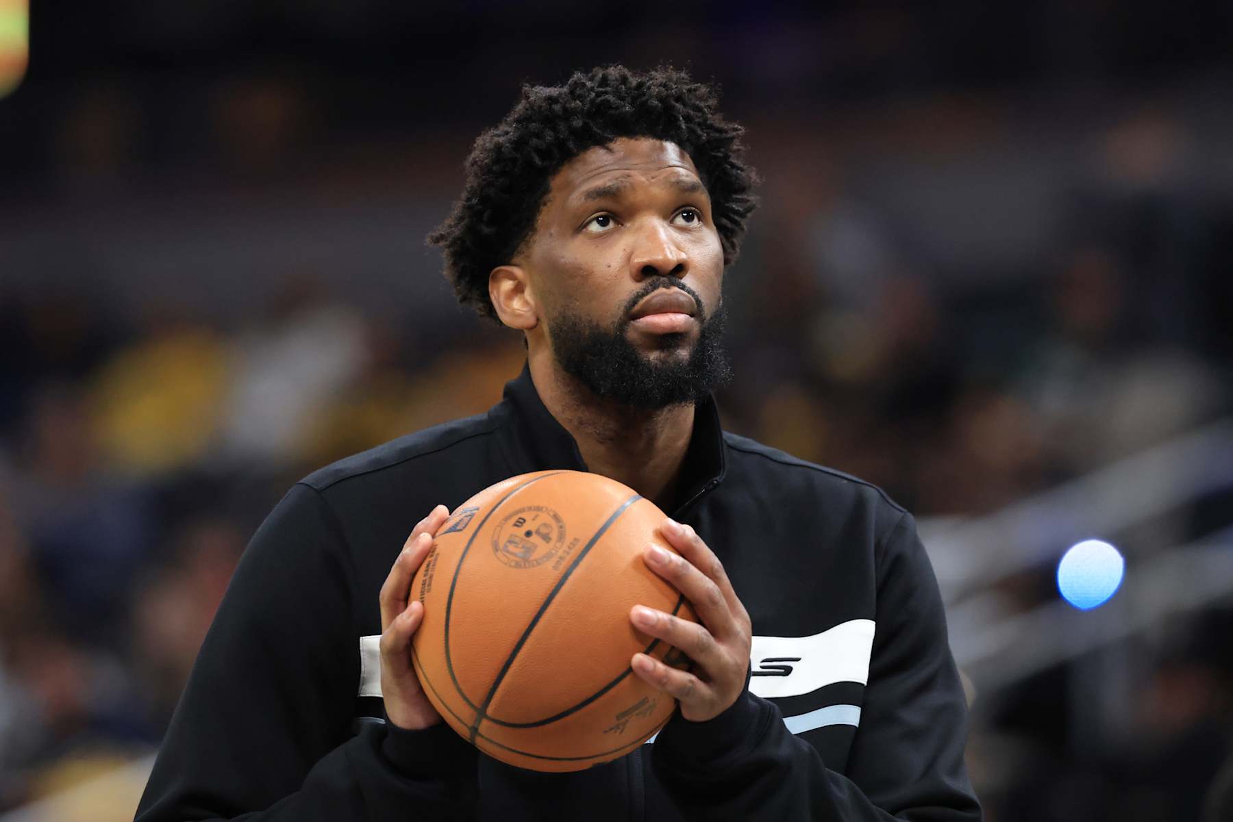 INDIANAPOLIS, INDIANA - OCTOBER 27: Joel Embiid #21 of the Philadelphia 76ers looks on in the game against the Indiana Pacers at Gainbridge Fieldhouse on October 27, 2024 in Indianapolis, Indiana. NOTE TO USER: User expressly acknowledges and agrees that, by downloading and or using this photograph, User is consenting to the terms and conditions of the Getty Images License Agreement. (Photo by Justin Casterline/Getty Images) INDIANAPOLIS, INDIANA - OCTOBER 27: Joel Embiid #21 of the Philadelphia 76ers looks on in the game against the Indiana Pacers at Gainbridge Fieldhouse on October 27, 2024 in Indianapolis, Indiana. NOTE TO USER: User expressly acknowledges and agrees that, by downloading and or using this photograph, User is consenting to the terms and conditions of the Getty Images License Agreement. (Photo by Justin Casterline/Getty Images)