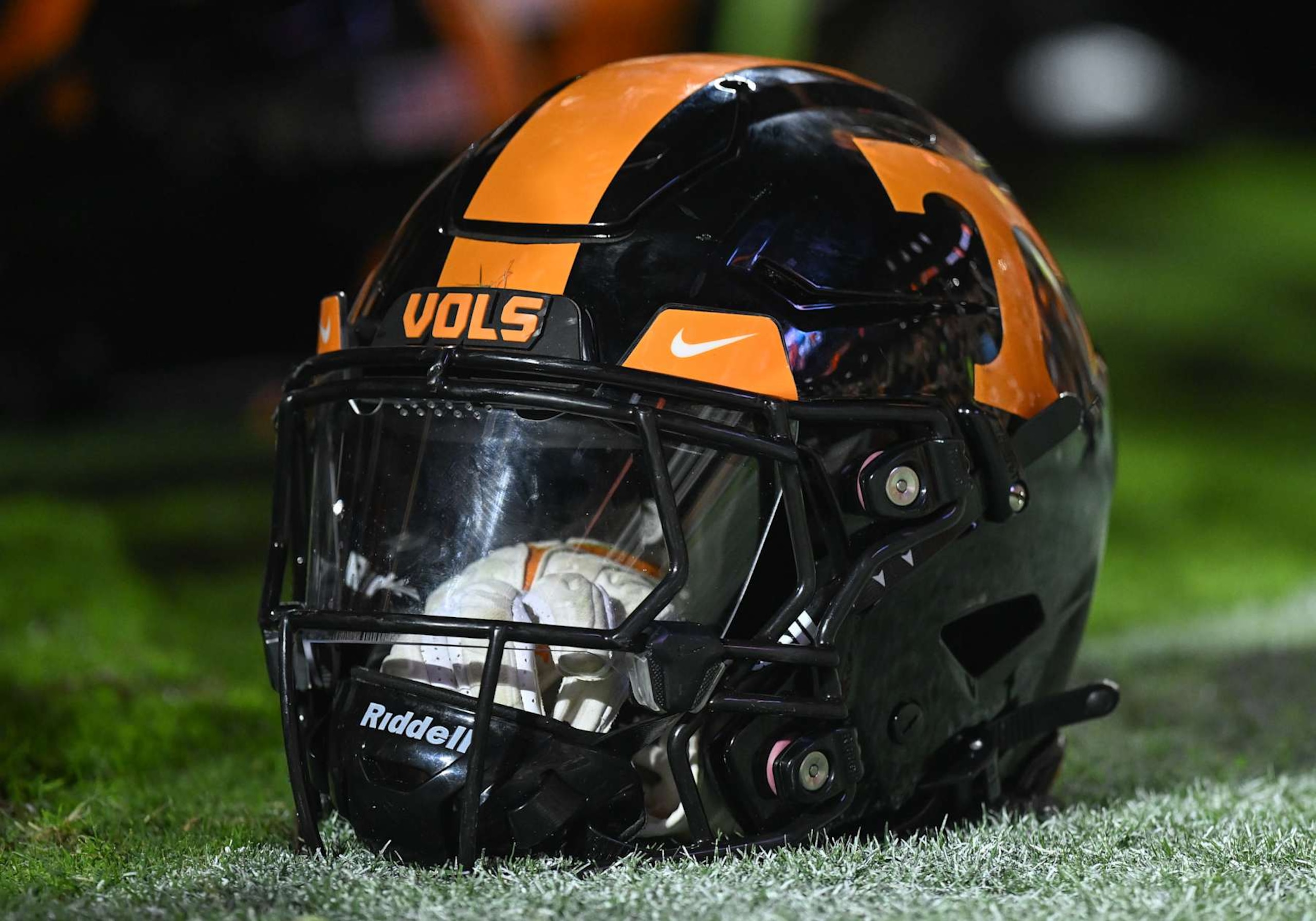 KNOXVILLE, TN - SEPTEMBER 30: Tennessee Volunteers helmet sits on the field during a college football game between the Tennessee Volunteers and the South Carolina Gamecocks on September 30, 2023, at Neyland Stadium, in Knoxville, TN. (Photo by Bryan Lynn/Icon Sportswire via Getty Images)