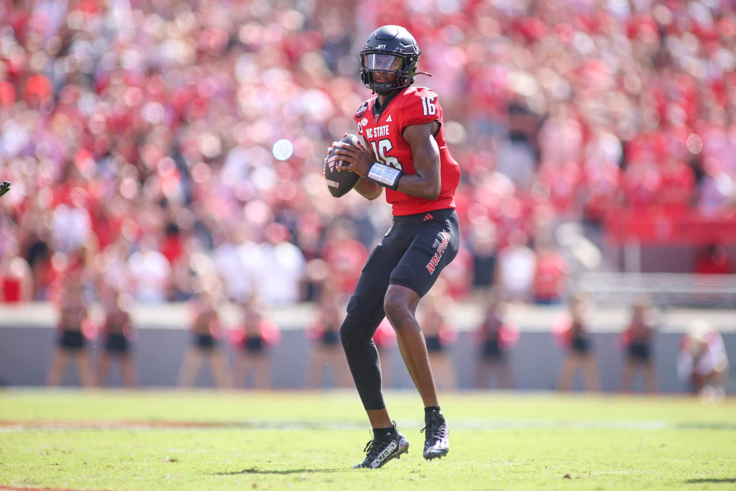 RALEIGH, NC - OCTOBER 05: North Carolina State Wolfpack quarterback CJ Bailey (16) looks to pass during the college football game between the North Carolina State Wolfpack and the Wake Forest Demon Deacons on October 5, 2024 at Carter-Finley Stadium in Raleigh, NC. (Photo by Nicholas Faulkner/Icon Sportswire via Getty Images)