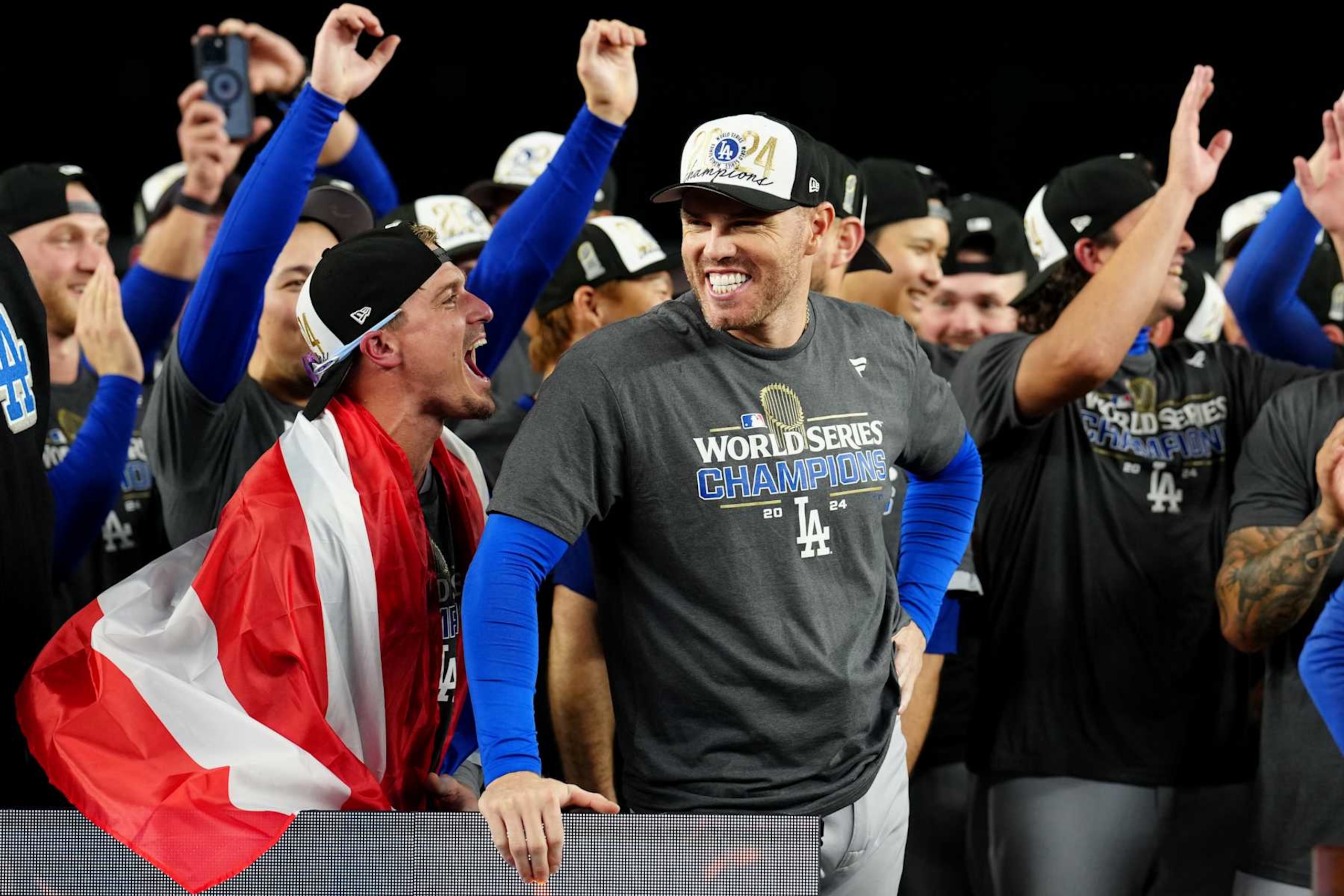 NEW YORK, NY - OCTOBER 30: Freddie Freeman #5 of the Los Angeles Dodgers reacts to being announce the 2024 Willie Mays World Series MVP after the Dodgers defeated the New York Yankees in Game 5 to clinch the 2024 World Series presented by Capital One at Yankee Stadium on Wednesday, October 30, 2024 in New York, New York. (Photo by Mary DeCicco/MLB Photos via Getty Images) NEW YORK, NY - OCTOBER 30: Freddie Freeman #5 of the Los Angeles Dodgers reacts to being announce the 2024 Willie Mays World Series MVP after the Dodgers defeated the New York Yankees in Game 5 to clinch the 2024 World Series presented by Capital One at Yankee Stadium on Wednesday, October 30, 2024 in New York, New York. (Photo by Mary DeCicco/MLB Photos via Getty Images)