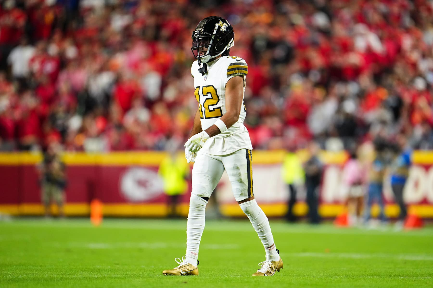 KANSAS CITY, MO - OCTOBER 07: Chris Olave #12 of the New Orleans Saints lines up before the snap during an NFL football game against the Kansas City Chiefs at GEHA Field at Arrowhead Stadium on October 7, 2024 in Kansas City, Missouri. (Photo by Cooper Neill/Getty Images)