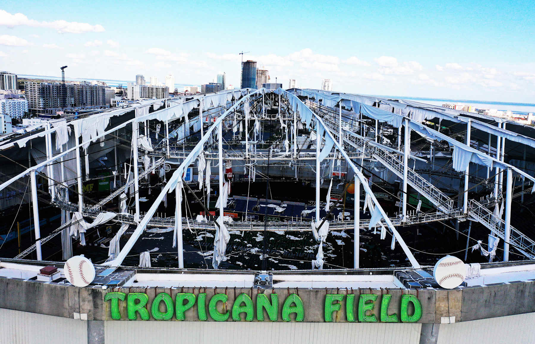CHIMCHIME, ST  PETERSBURG, FLORIDA, UNITED STATES - 2024/10/13: (EDITORS NOTE: Image taken with drone) In this aerial view, the domed roof at Tropicana Field, the home of the Tampa Bay Rays, is seen ripped to shreds from Hurricane Miltonís powerful winds in St. Petersburg. The storm passed through the area on October 10, 2024, making landfall as a Category 3 hurricane in Siesta Key, Florida. (Photo by Paul Hennessy/SOPA Images/LightRocket via Getty Images)